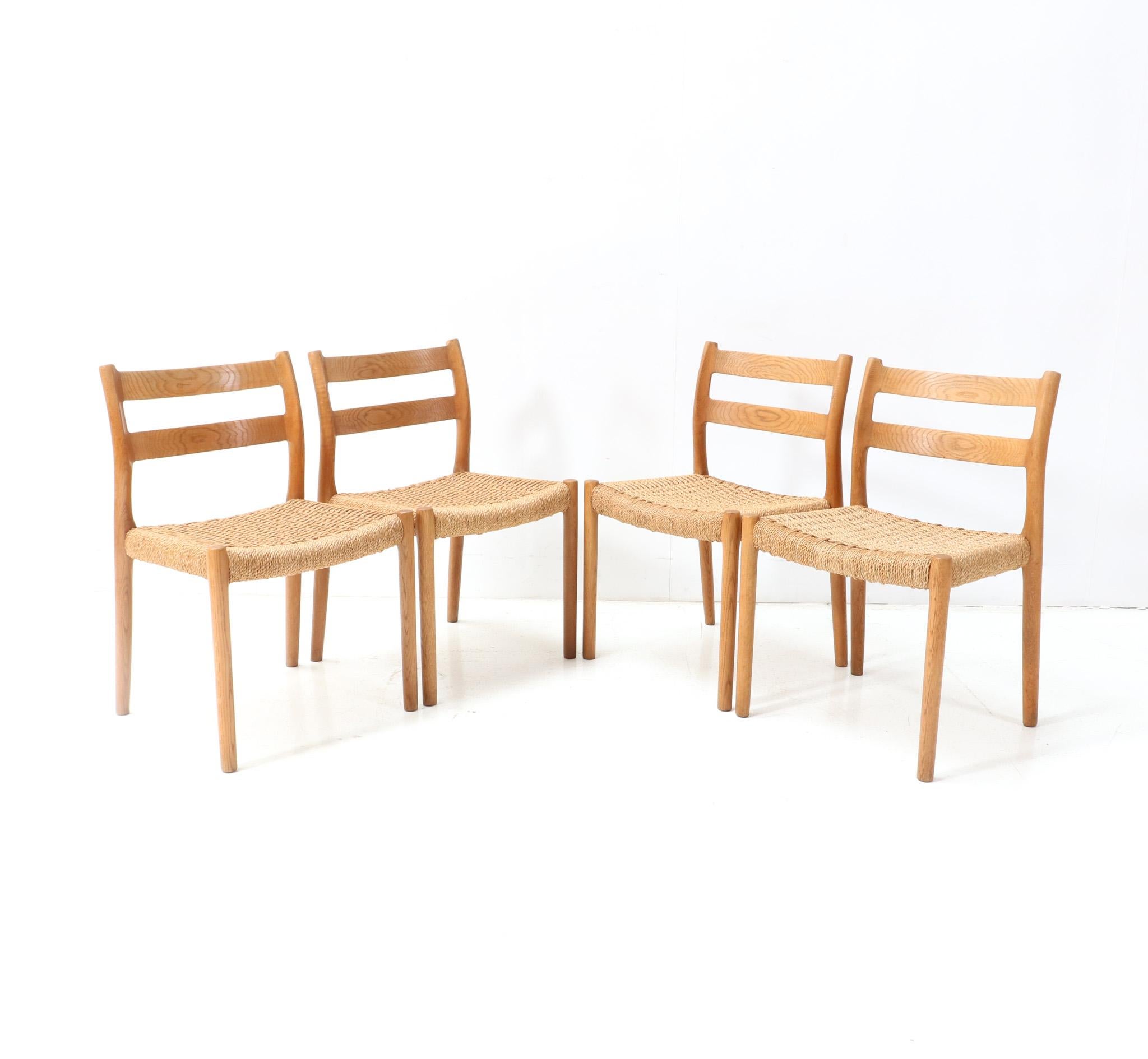Four Oak Mid-Century Modern Model 84 Dining Room Chairs by Niels Otto Møller In Good Condition In Amsterdam, NL
