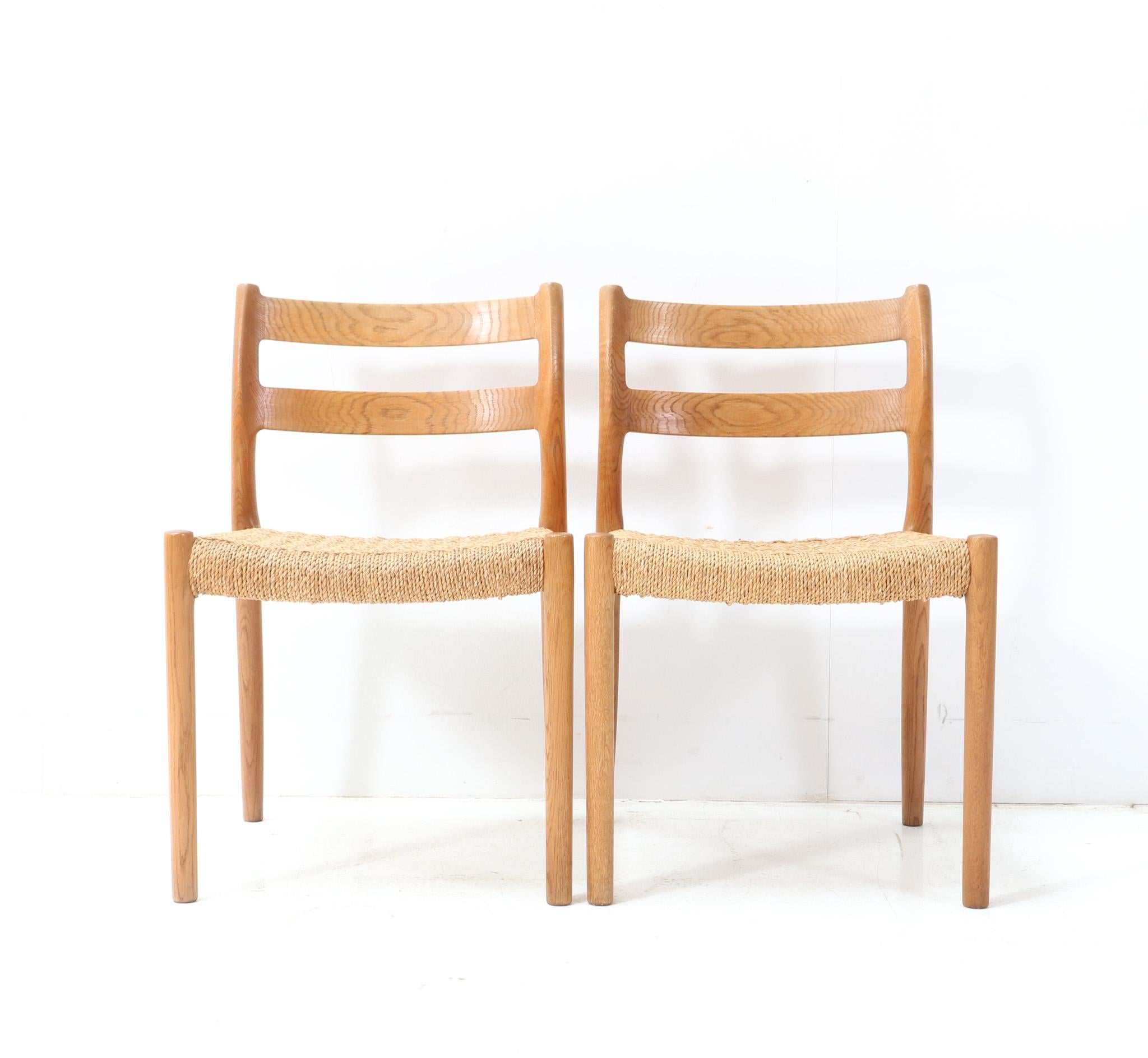 Four Oak Mid-Century Modern Model 84 Dining Room Chairs by Niels Otto Møller 1