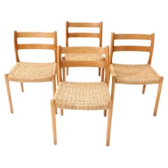 Four Oak Mid-Century Modern Model 84 Dining Room Chairs by Niels Otto Møller