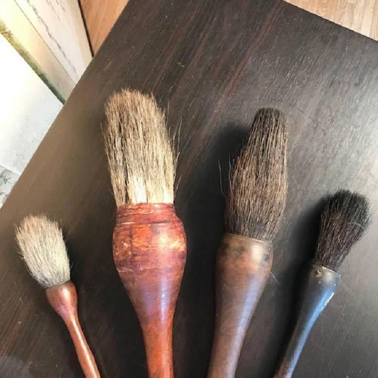 Here's a rare find from a collector we recently visited in Japan. 

These four large-scale Japanese and Chinese calligraphy wooden ink wash painting brushes come from a an old artists collection. They are seldom found today having been extensively
