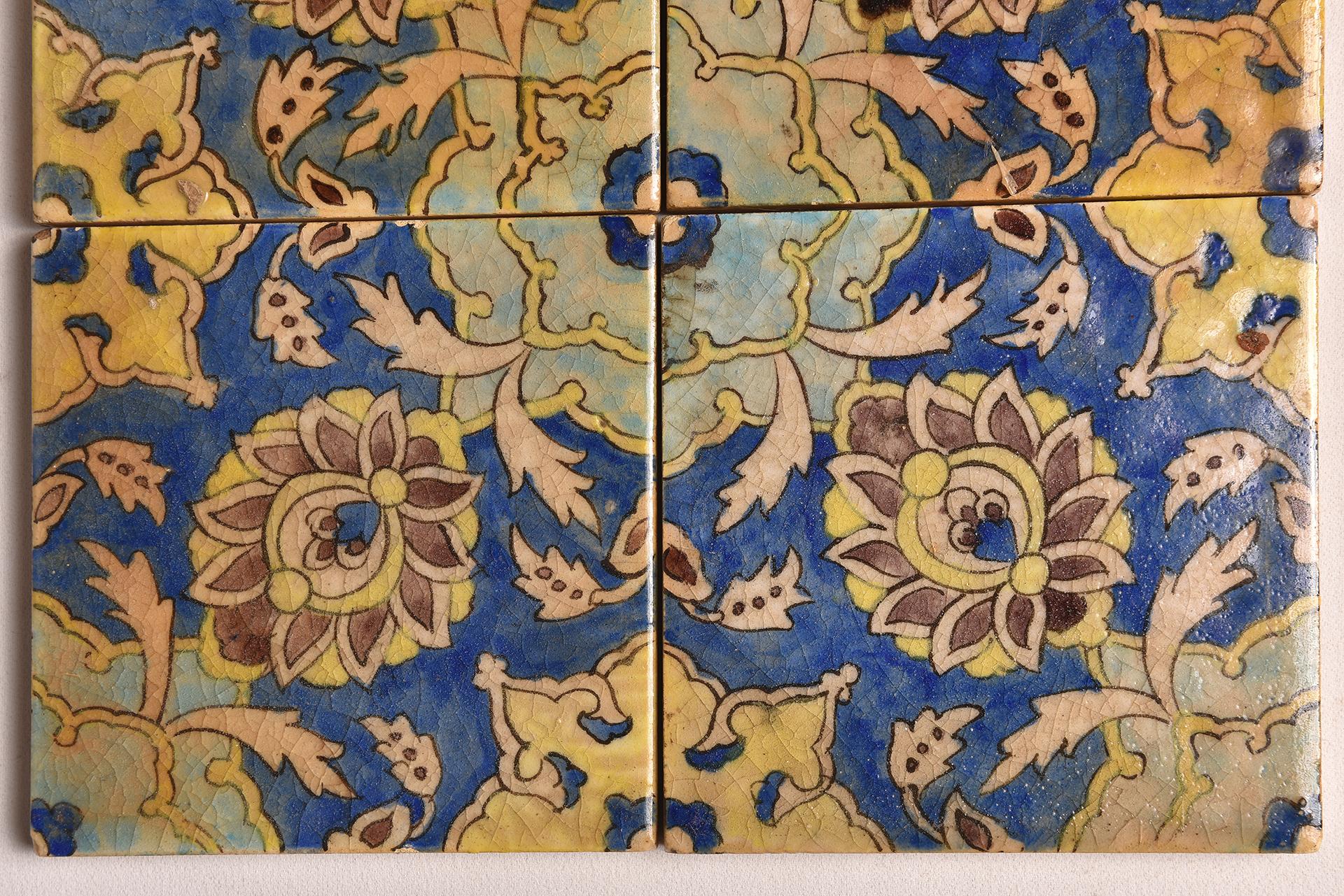 SN - Here are four tiles that form a square with their bue and yellow medallion, on a blue background. All is painted under enamel.
They were used to cover the walls of temples and some important houses.
Idea: terrace by the sea or porch in the