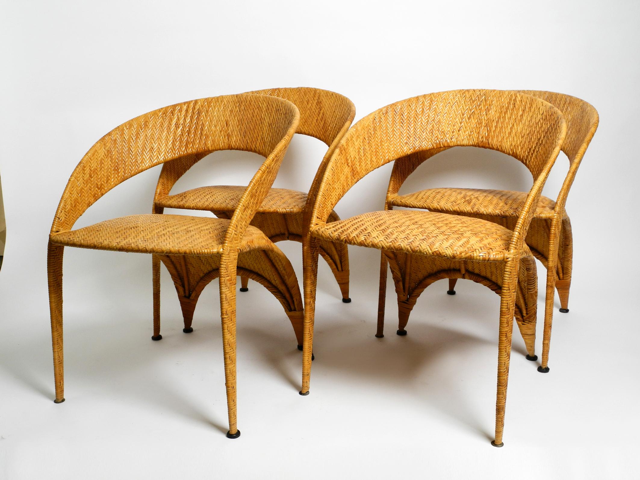 German Four original 1980s Postmodern rattan armchairs