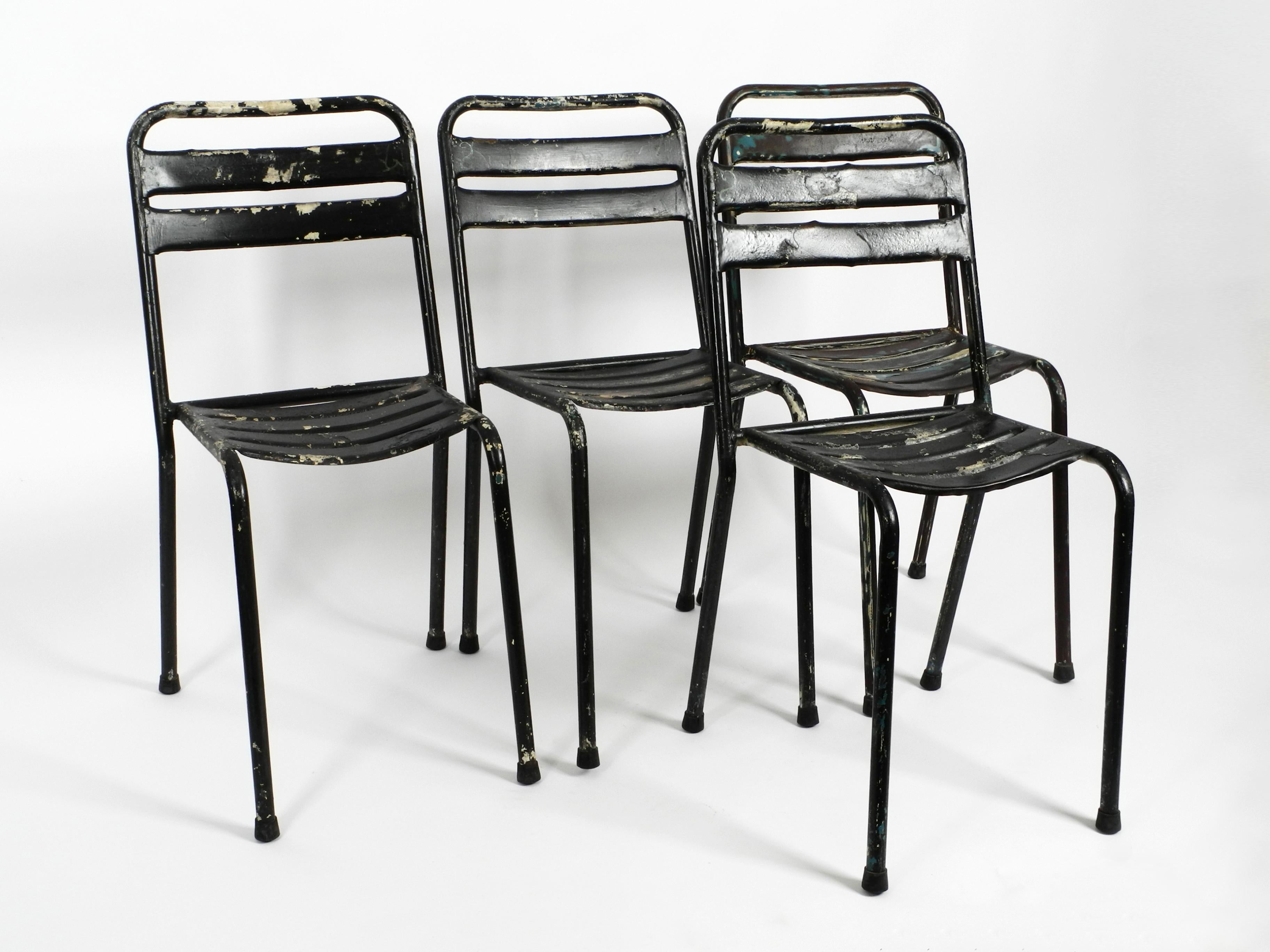 Four original French sanded 1950s Tolix Bistro cafe stackable chairs.
Design Classics by Xavier Pauchard. Made in France.
Minimalistic, very robust industrial design. Chairs are made entirely of metal and are very light.
Very good vintage