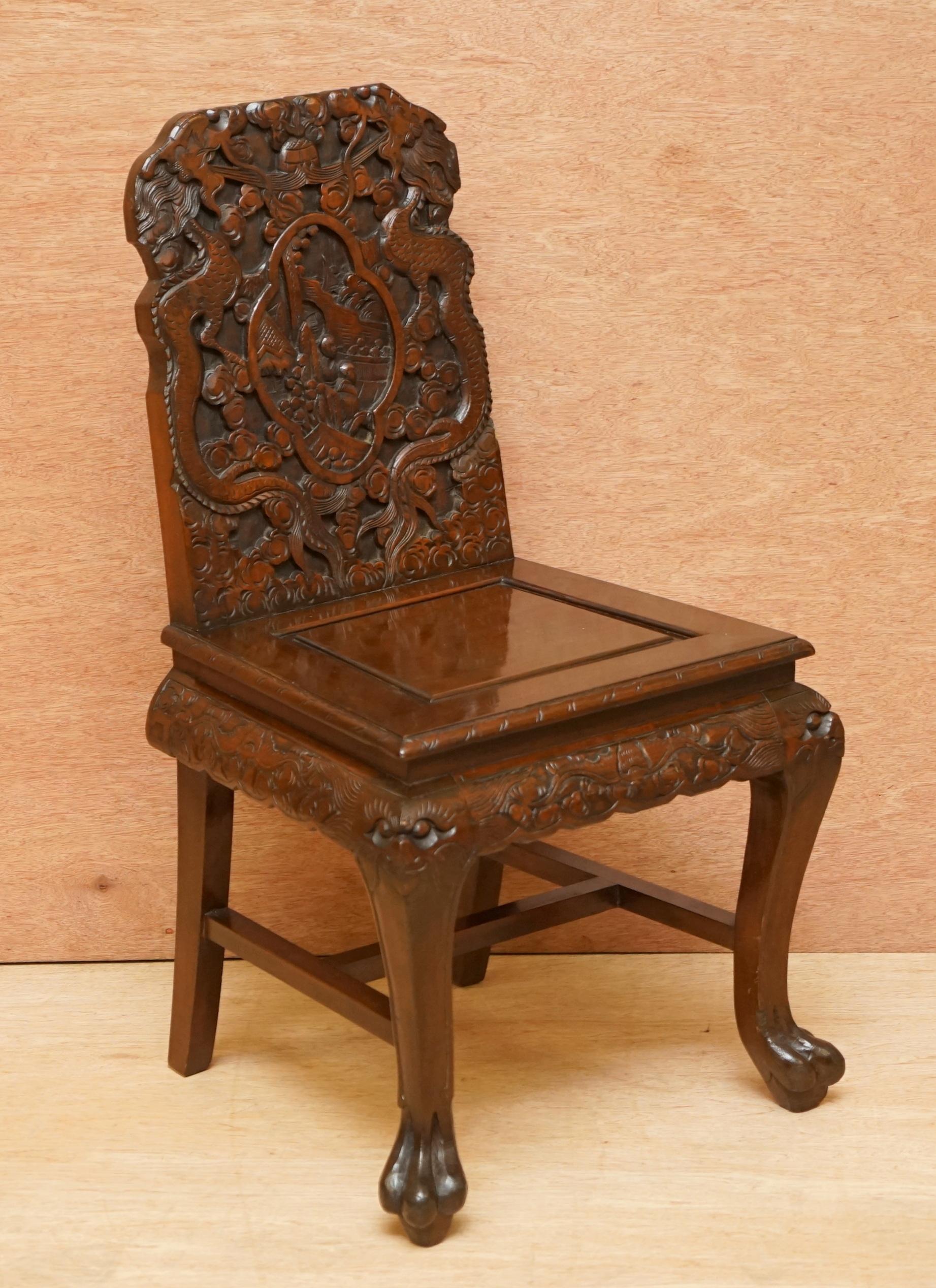 We are delighted to offer for sale this stunning suite of 4 Chinese Export circa 1900 hand carved dragon dining or occasional chairs

These are a very good looking and expertly crafted suite of dining chairs. The detail is never ending, each one