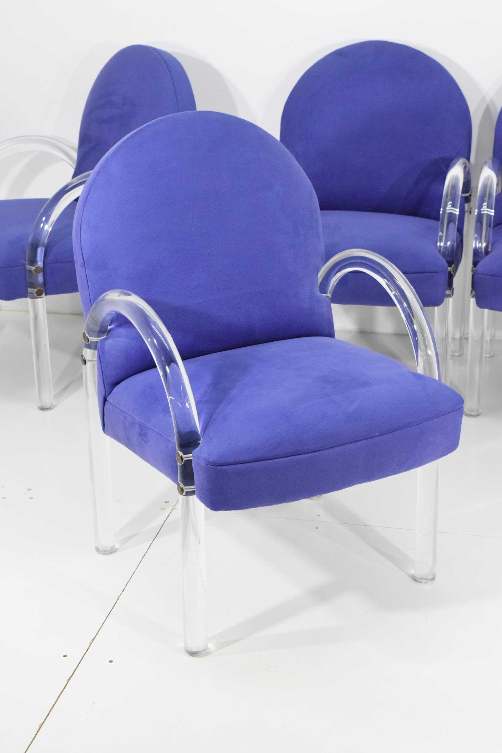 Chairs have solid curved Lucite arms and are upholstered in a rich lavender microfiber. Brass fittings. Upholstery is wonderful or you can change if you desire. Foam is great as well.
 