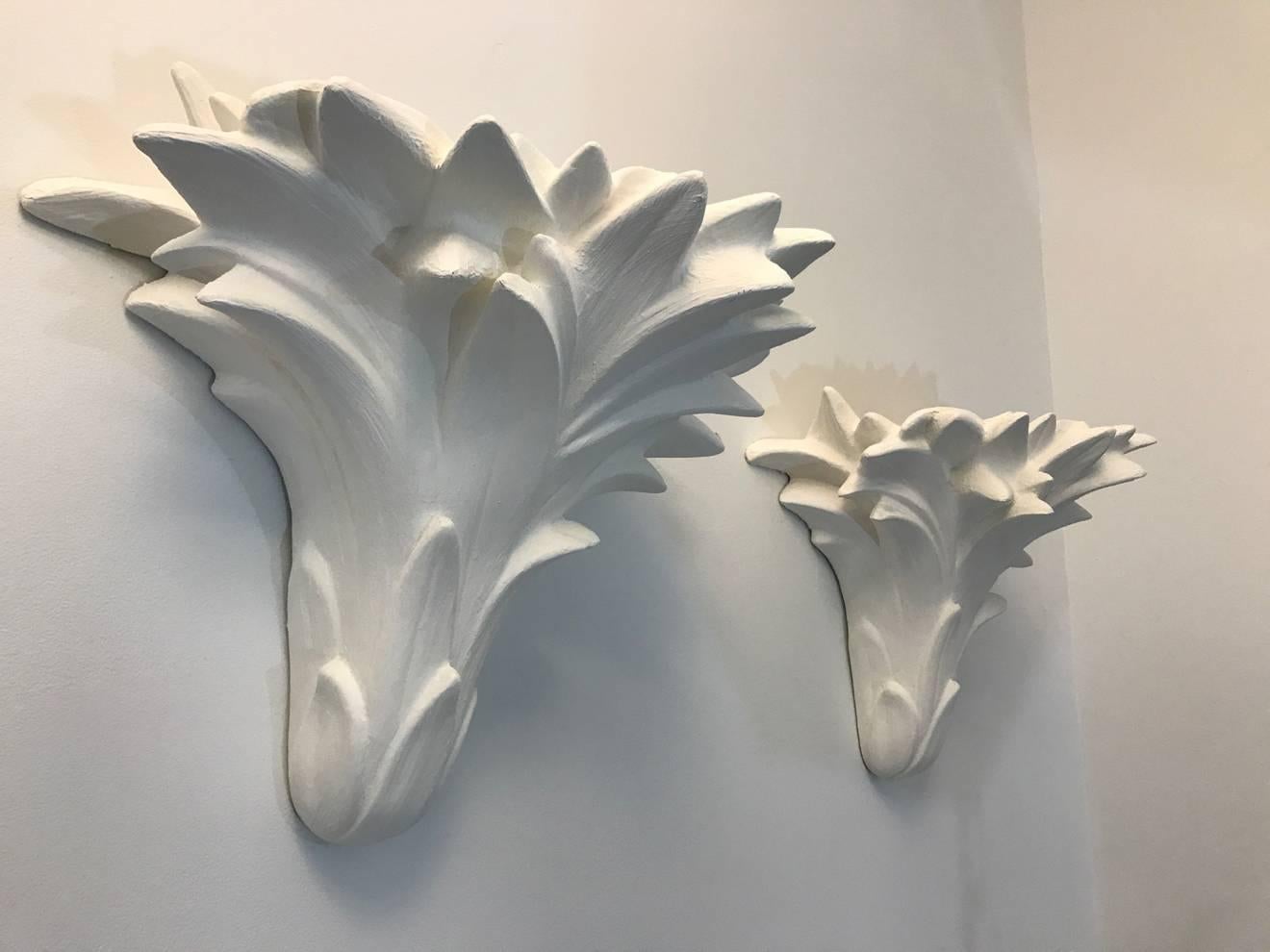 Four Serge Roche style palm sconces with plaster finish circa 1970s.
Refinished and rewired.