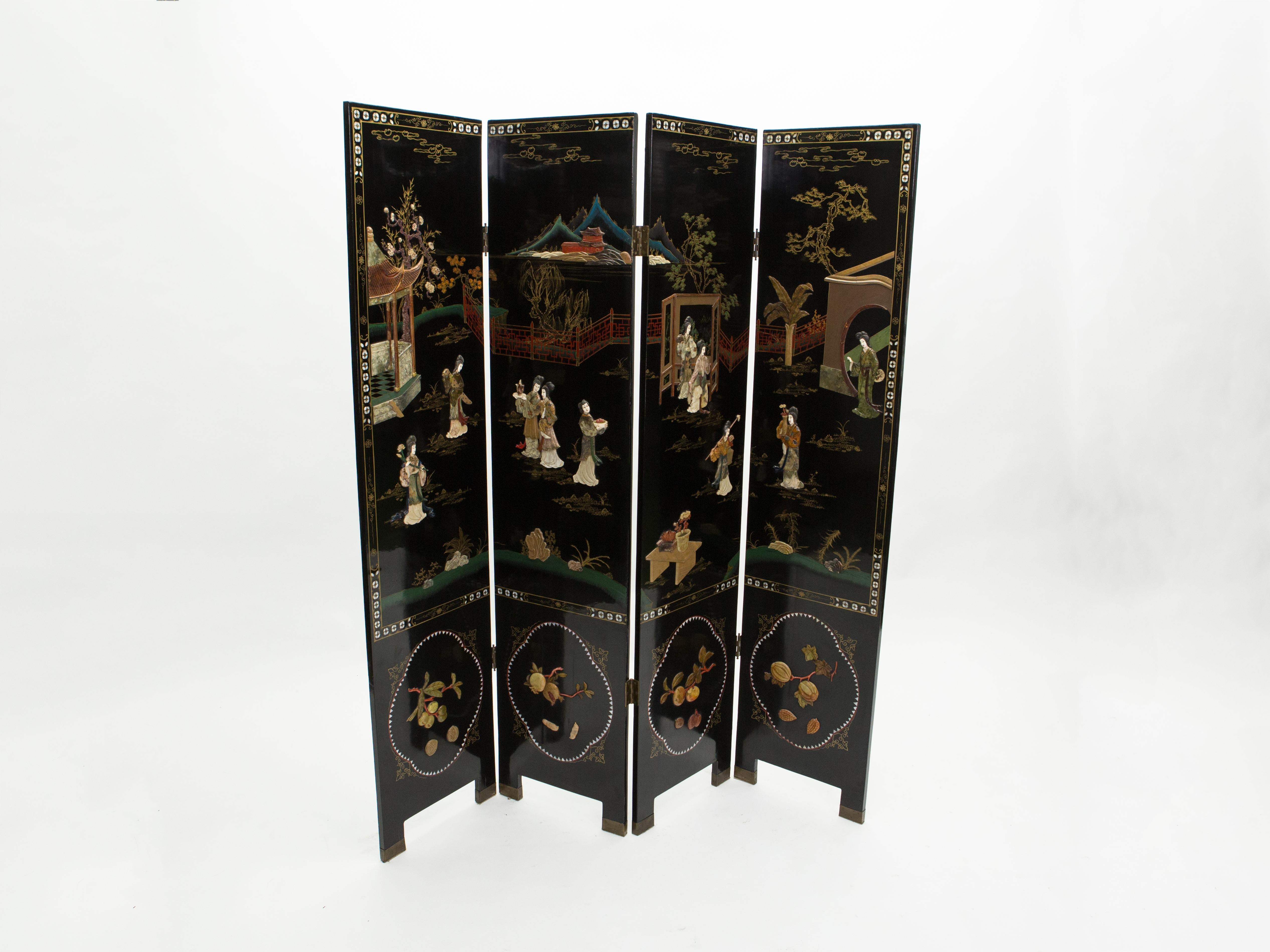 Beautiful 1940s Chinese four-panel lacquered screen featuring a courtyard scene of women engaged in leisurely activities on one side, and colorful birds and foliage on the other side. The panels are lacquered, with soft pastel color pigments,