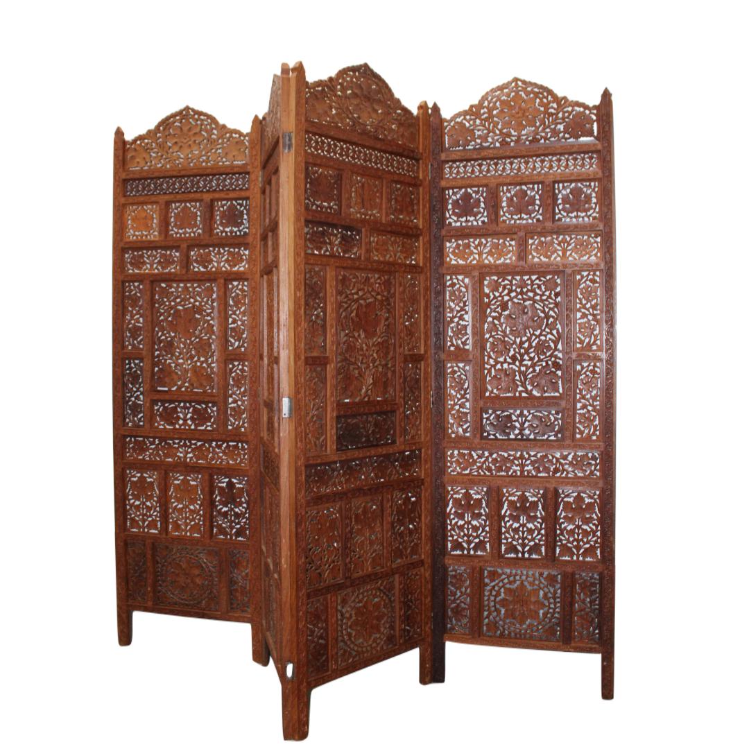 C. 20th century.

Four panel floor screen, teakwood w/ intricately carved leaf & grape Design.