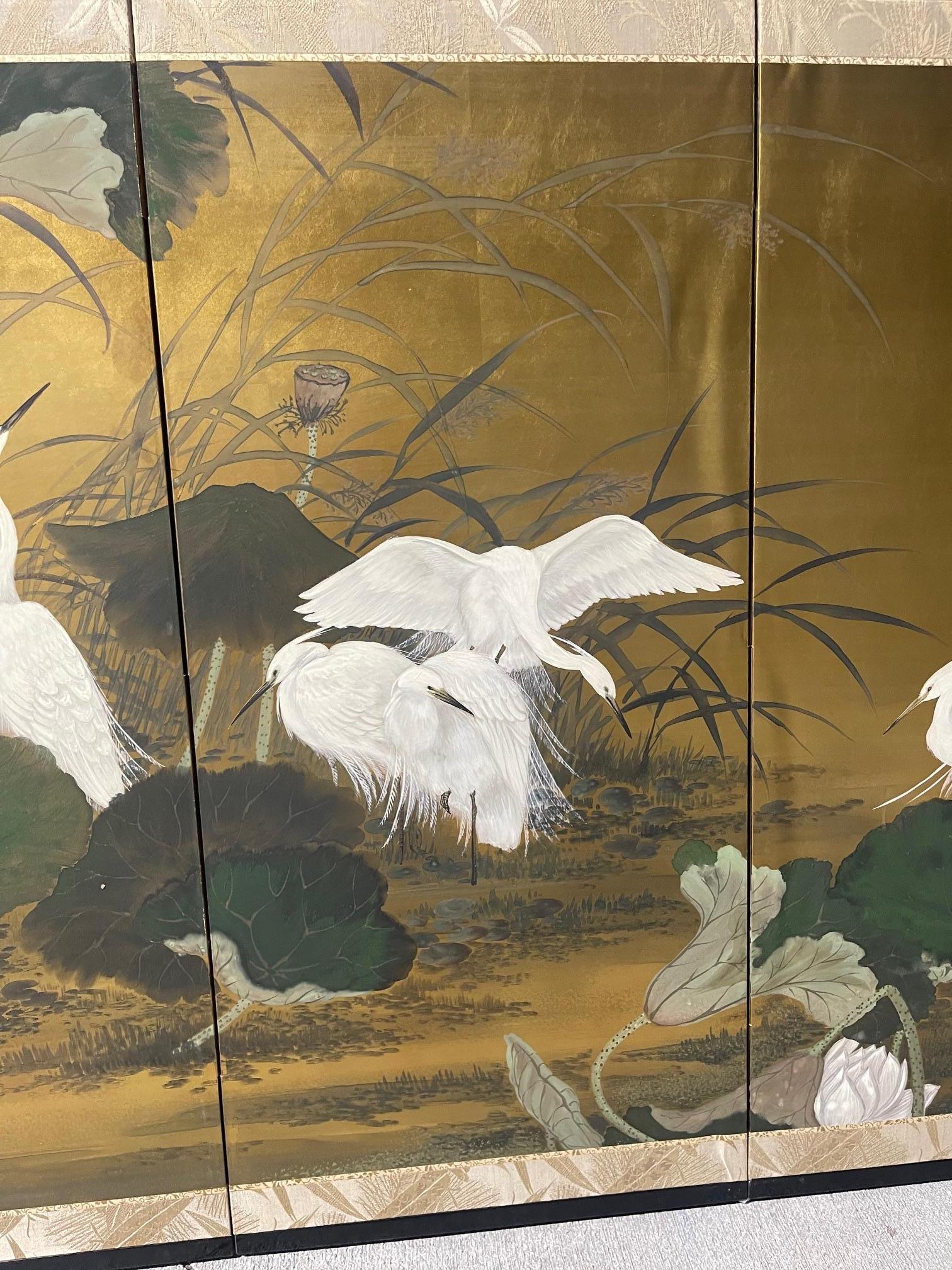 Gold Leaf Four-panel Japanese Byobu Folding Screen depicts a scene of Egrets, 20th Century For Sale