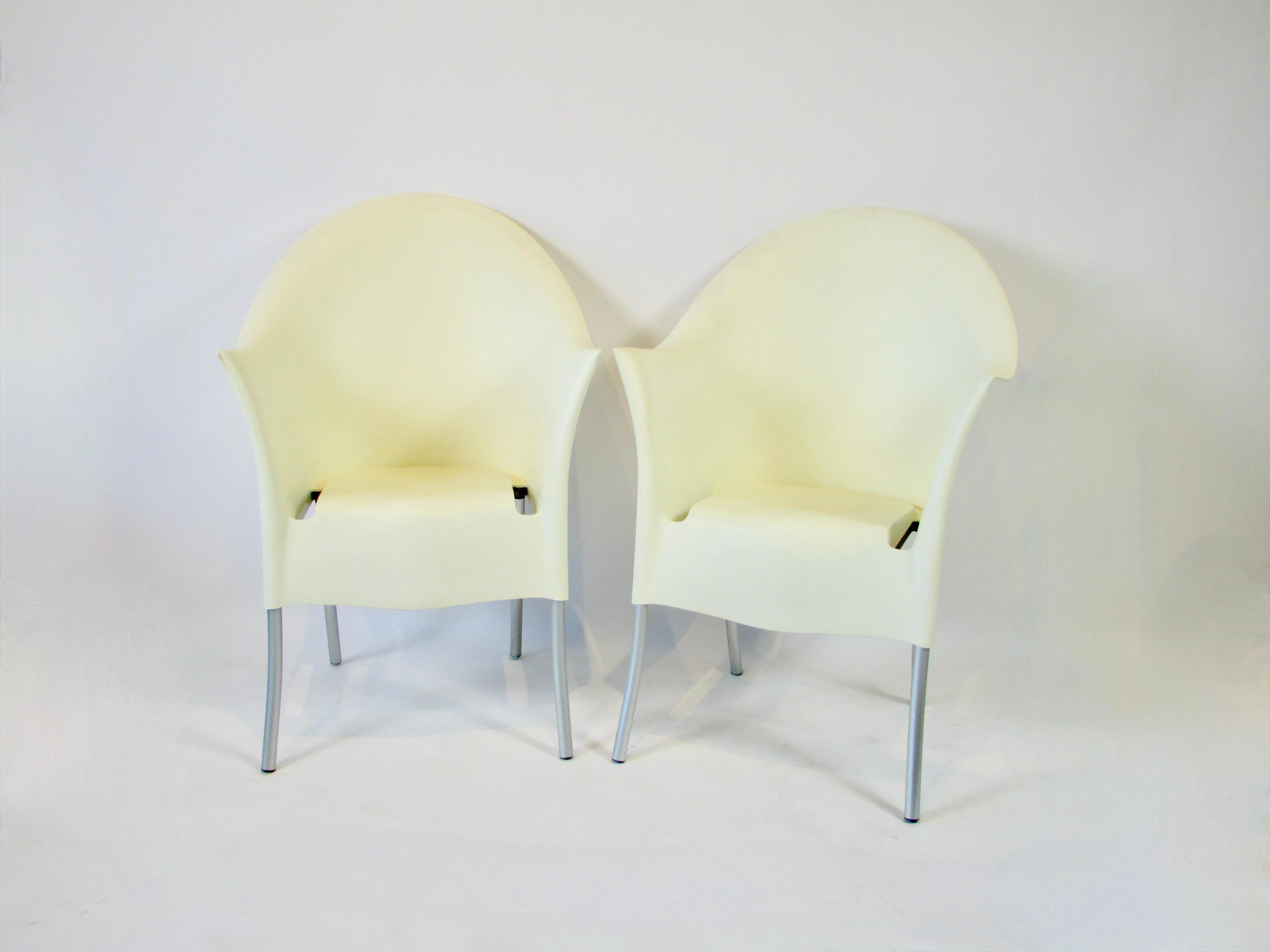 Set of four Phillipe Starck stacking or nesting lounge chairs. Well marked on underside Aleph by Starck Made in Italy, Lord YO by Sark Made in Italy. Well made chairs. Polypropylene shell bolts to Aluminum frame. Maybe the most comfortable and