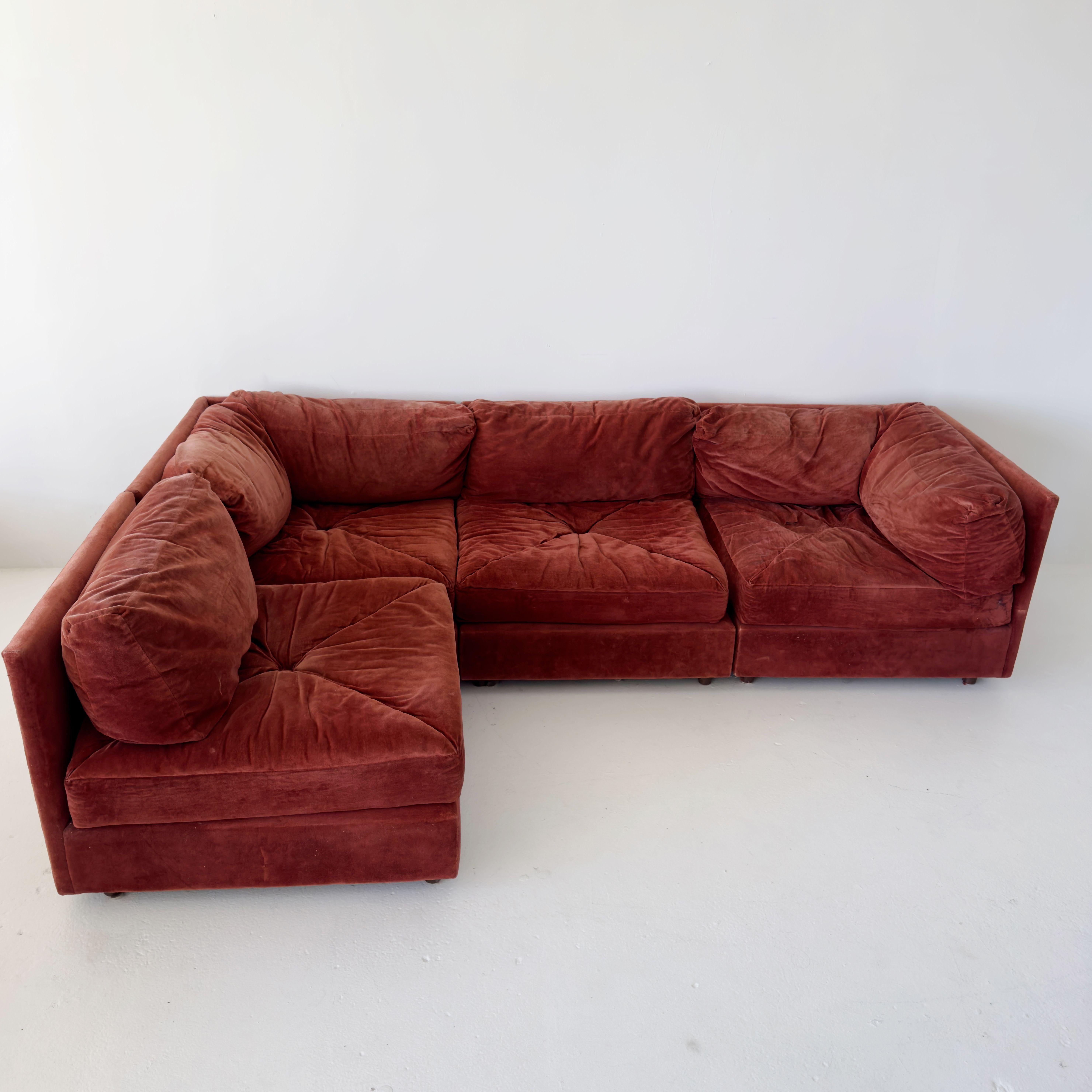four part 1970s playpen pit sectional sofa. original rust red velvet upholstery has signs of wear and age but nice color and good condition overall, amazingly comfortable and versatile.

Each section: L33 W33 H25 SH14
L configuration: L99 D66 H25