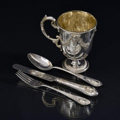 Four-piece antique silver christening set