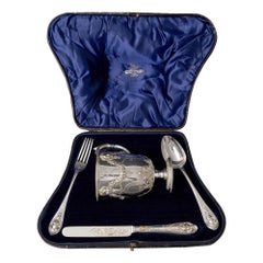 Four-piece antique silver christening set
