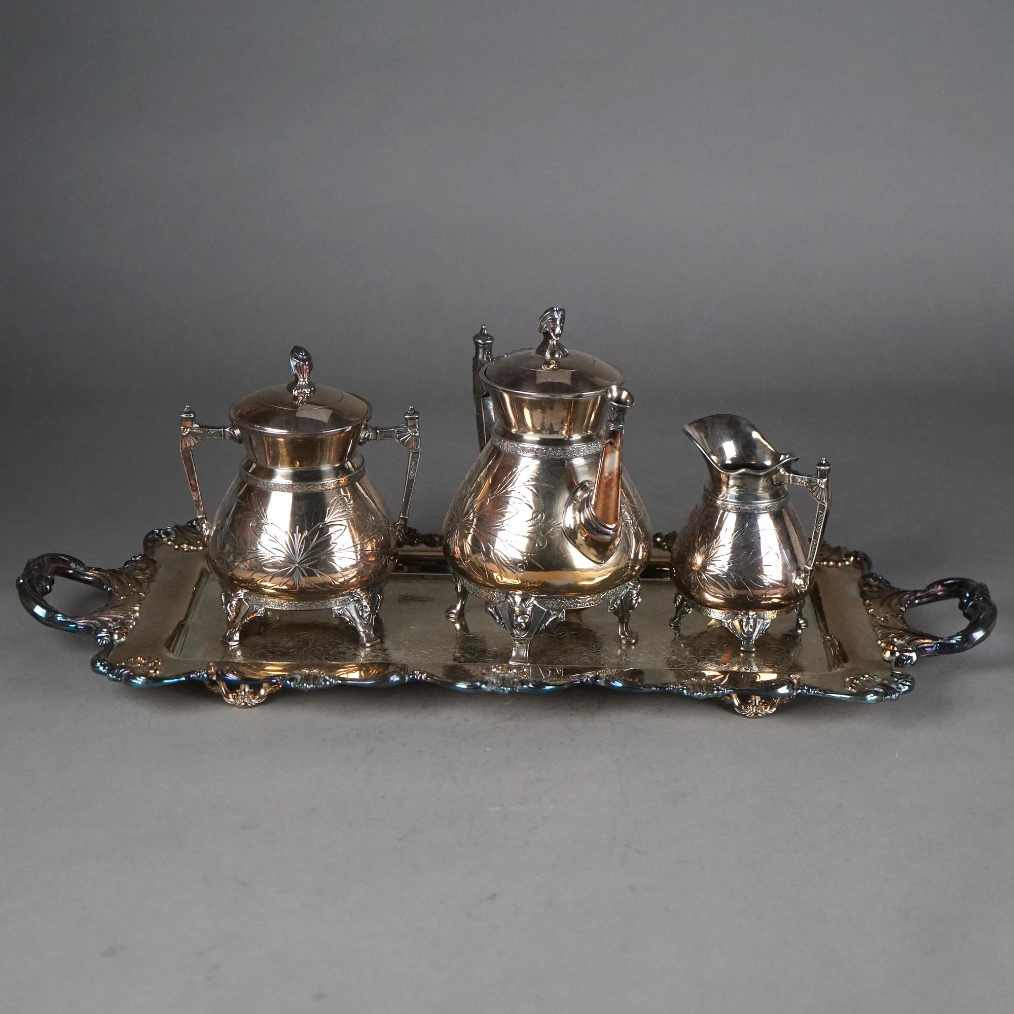 Servizio da tè con piedini in argento placcato in quattro pezzi con incisione a fogliame C1890

Misure: 9 