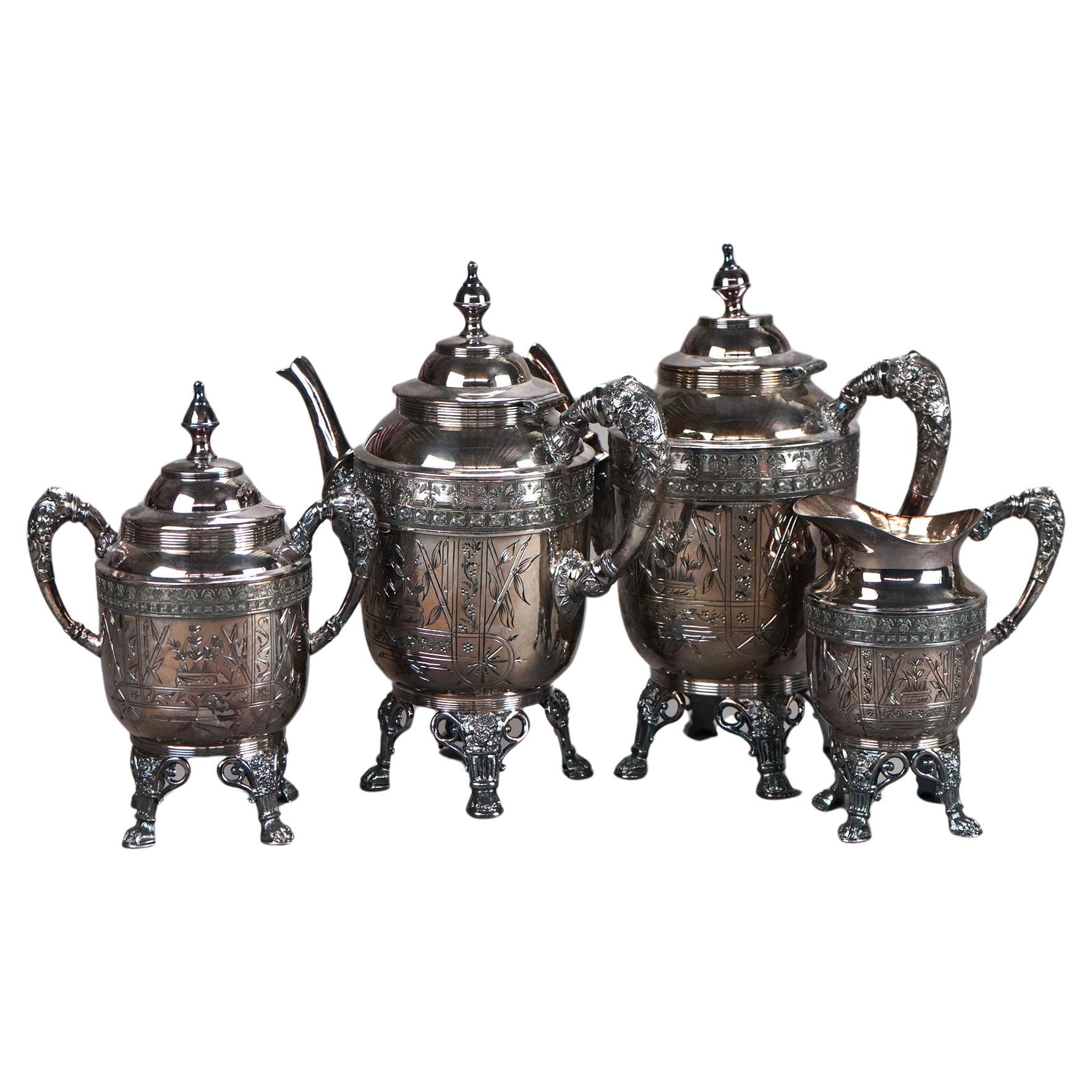 Juego de té antiguo de cuatro piezas con pie plateado C1890