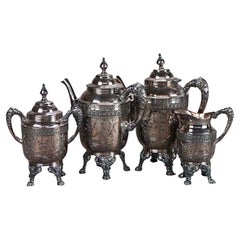 Juego de té antiguo de cuatro piezas con pie plateado C1890