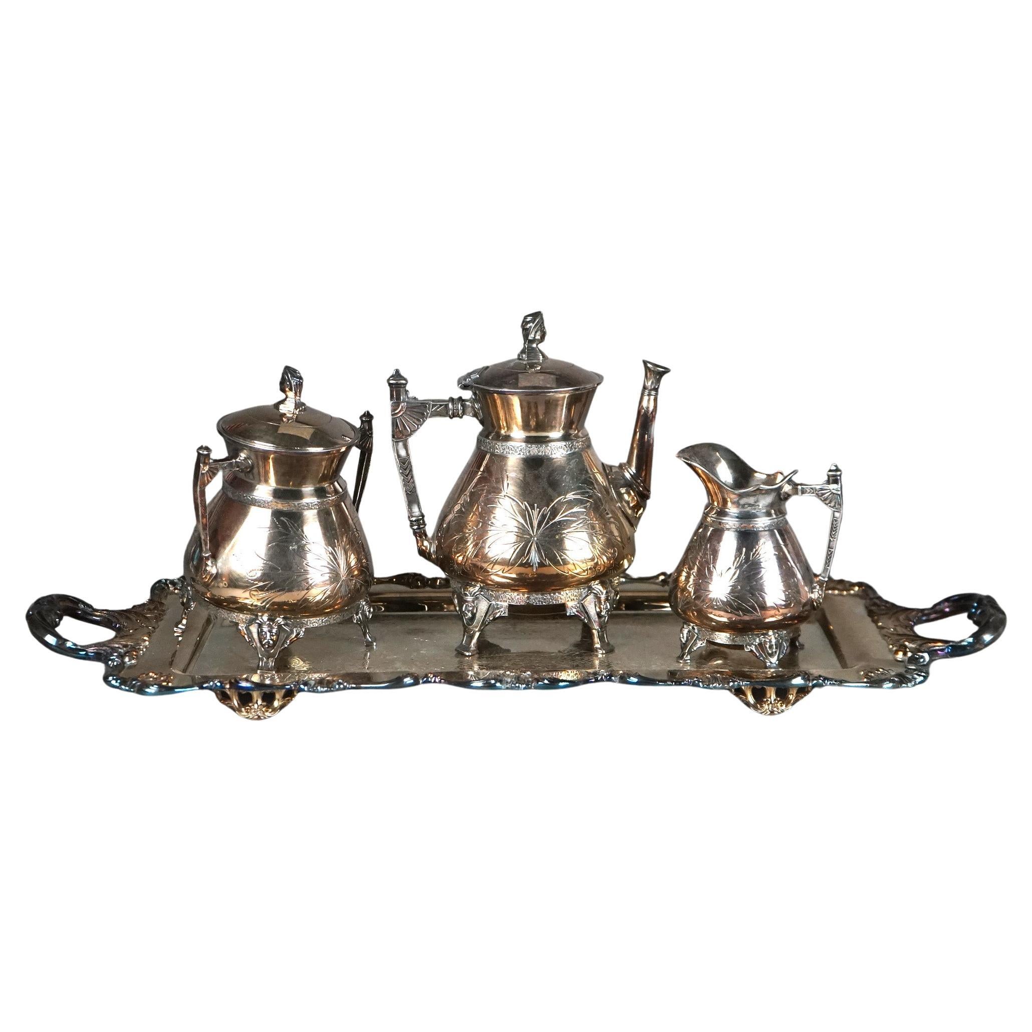 Juego de té antiguo de cuatro piezas con pie plateado C1890