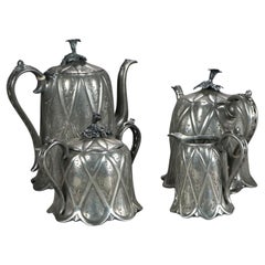 Juego de té antiguo de cuatro piezas bañado en plata C1890