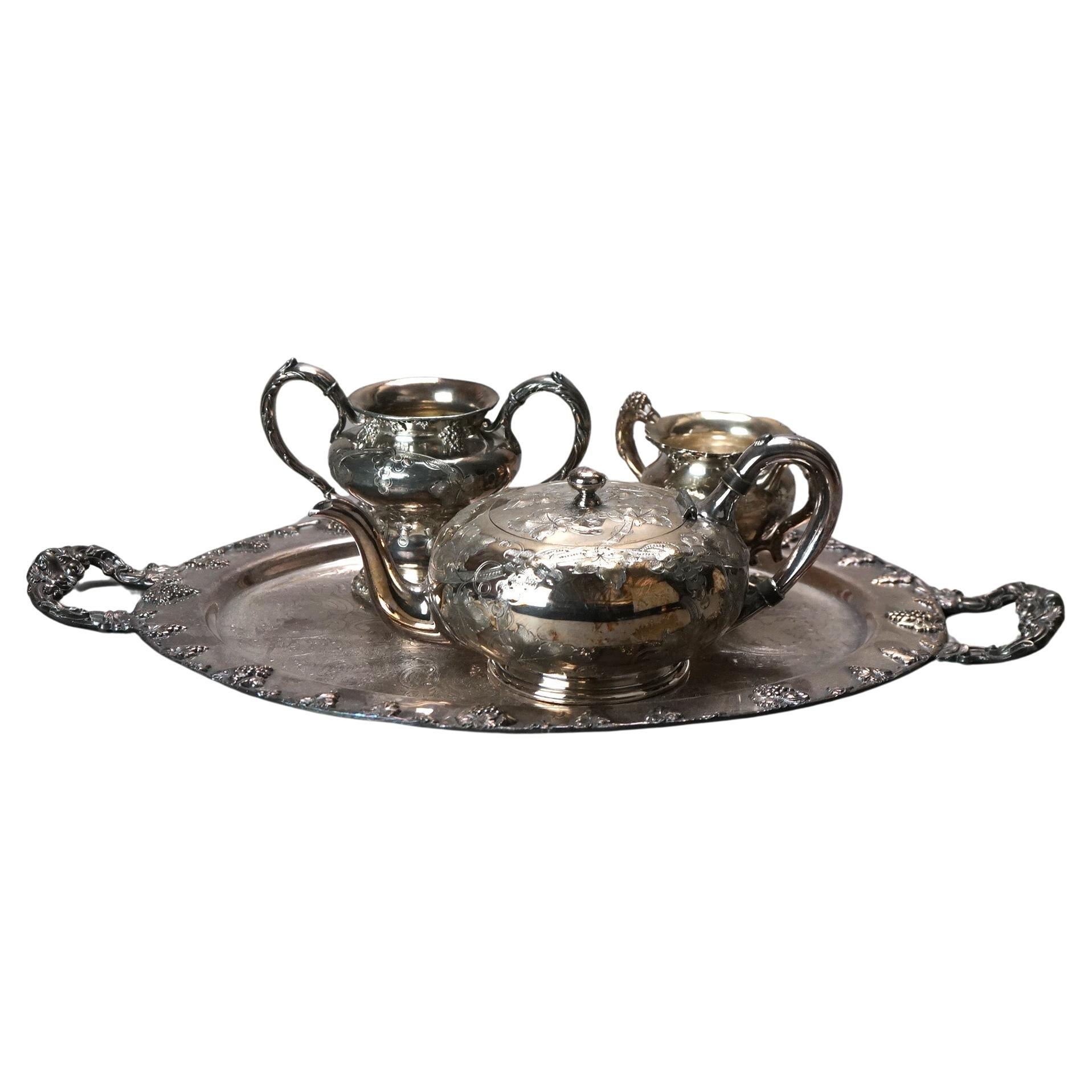 Juego de té antiguo de cuatro piezas bañado en plata C1890