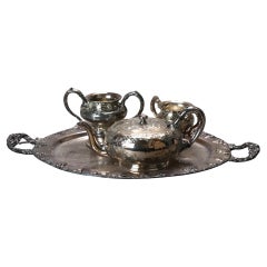 Juego de té antiguo de cuatro piezas bañado en plata C1890