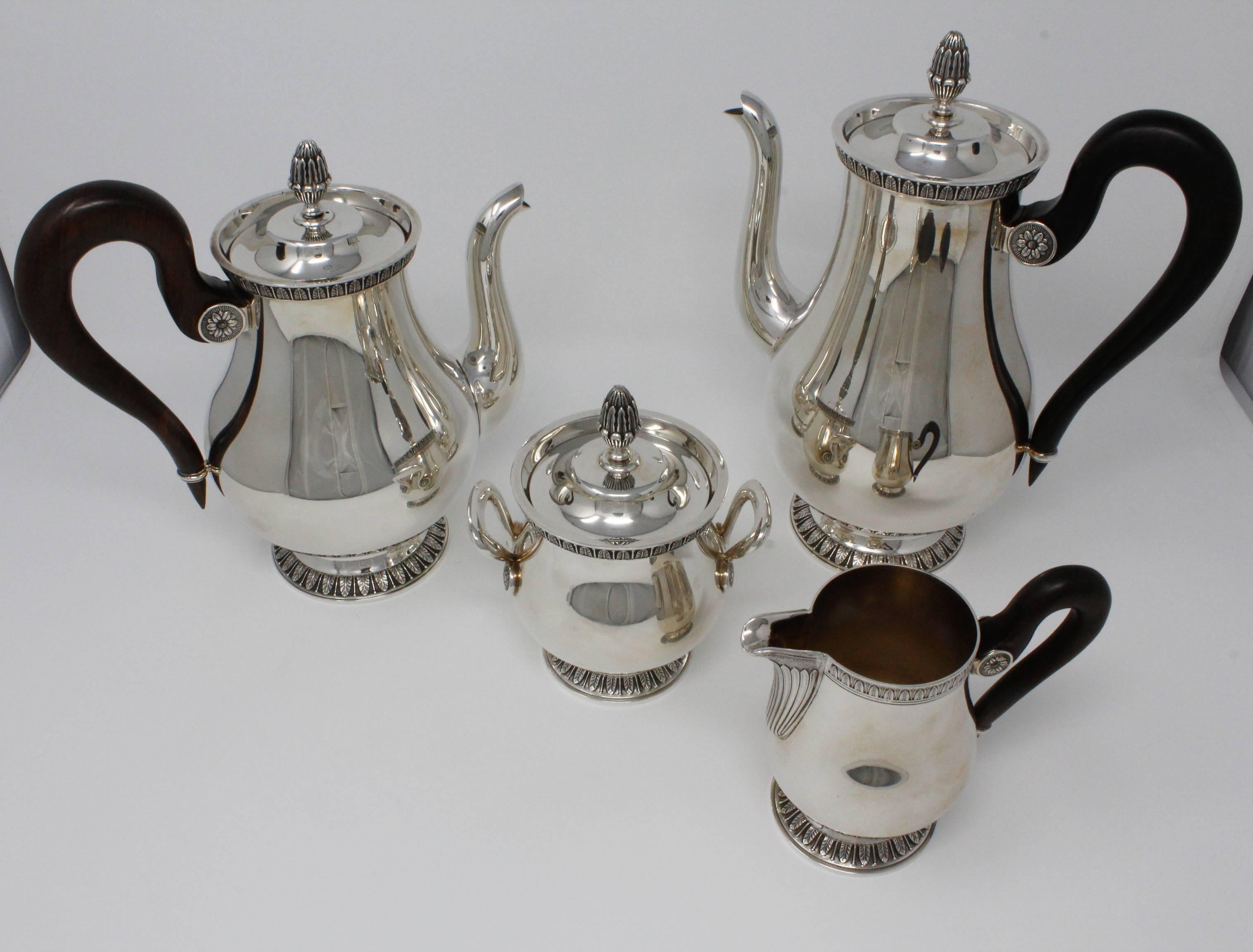 4 Pc. Christofle Tea Set, Silver Plated, Malmaison-Beauharnais Pattern. 

Includes Tea Pot, Coffee Pot, Sugar Bowl, and Creamer. 