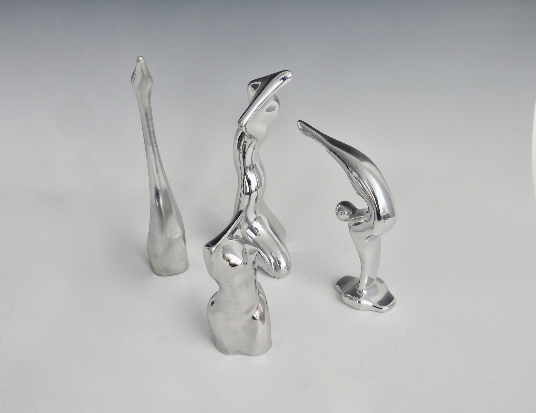 Canadian Four Piece Collection of Polished Aluminum Stylized Figures by Hoselton