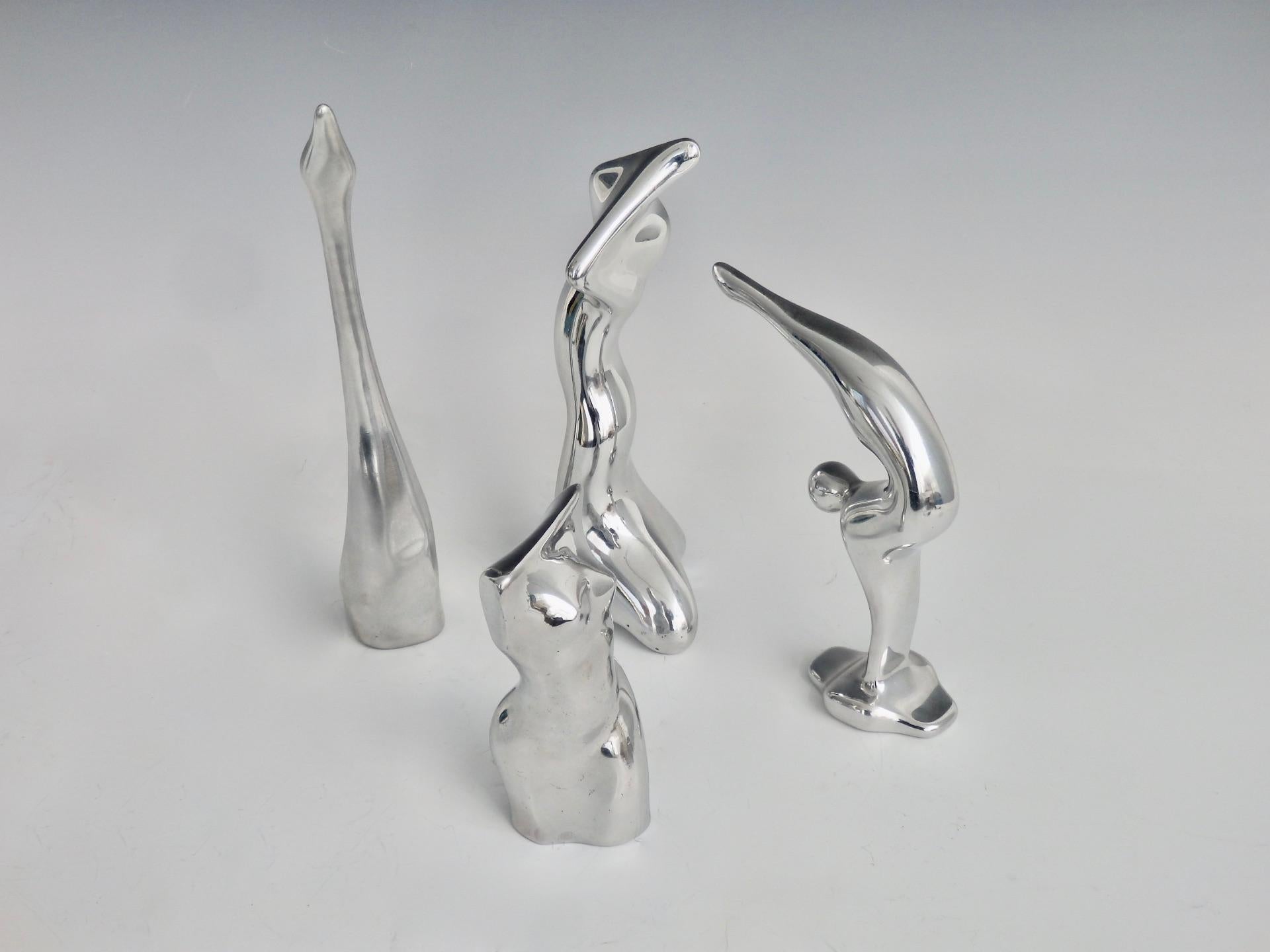 Four Piece Collection of Polished Aluminum Stylized Figures by Hoselton In Good Condition In Ferndale, MI