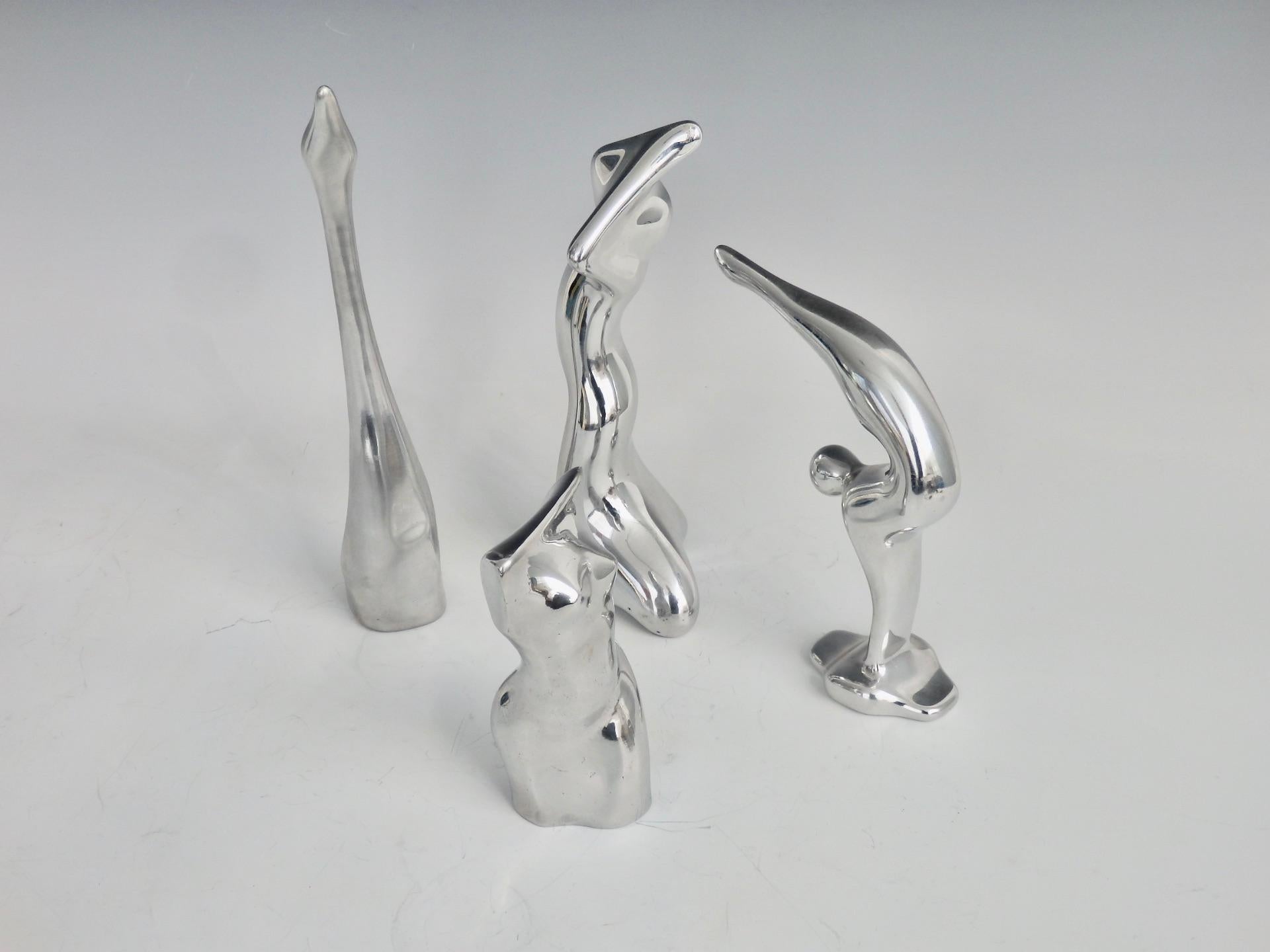 20th Century Four Piece Collection of Polished Aluminum Stylized Figures by Hoselton