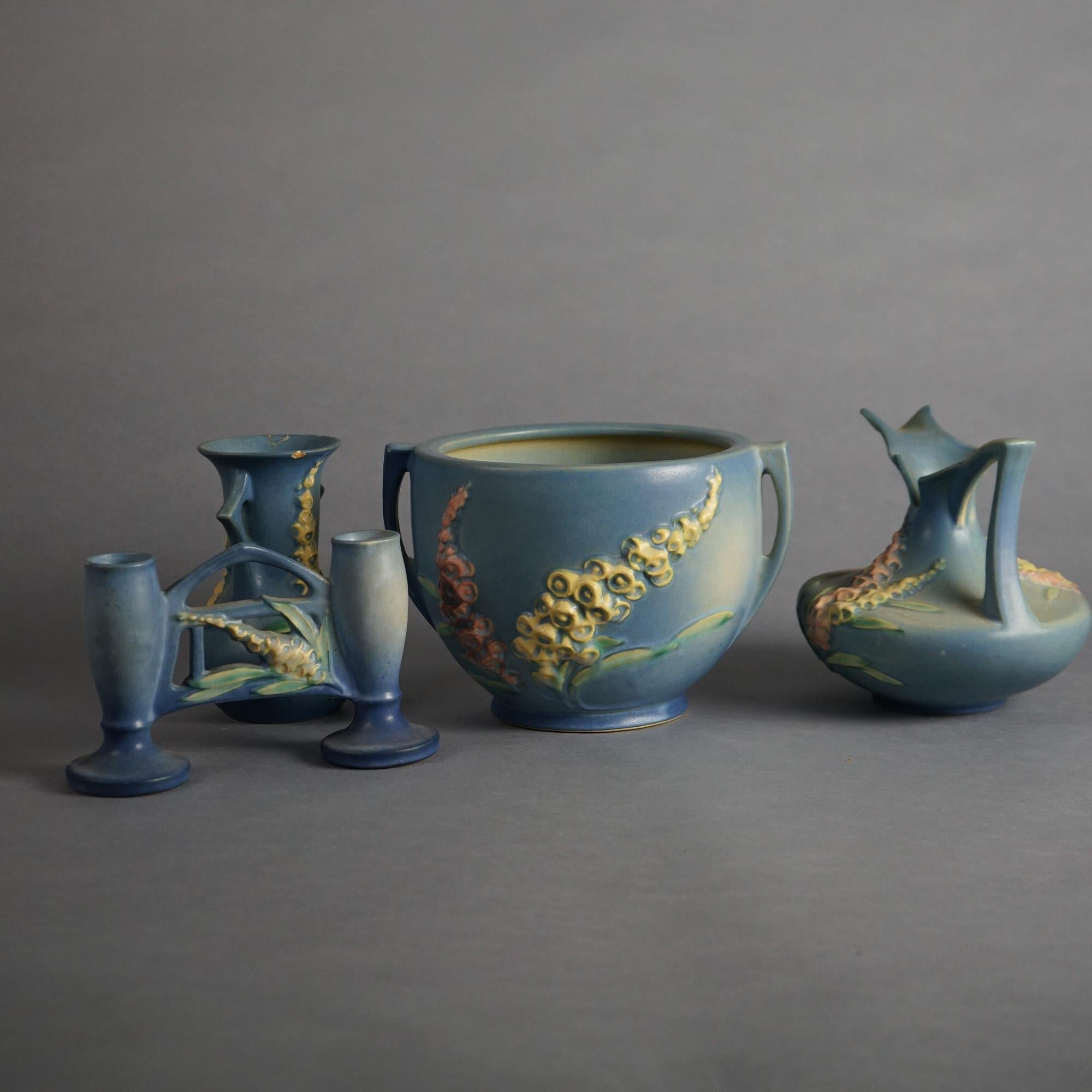 Four Pieces of Blue Roseville Art Pottery with Foxglove Pattern Mid 20thC

Measures - 6.25