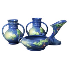 Four Pieces of Blue Roseville Art Pottery with Fuchsia Pattern Mid 20thC
