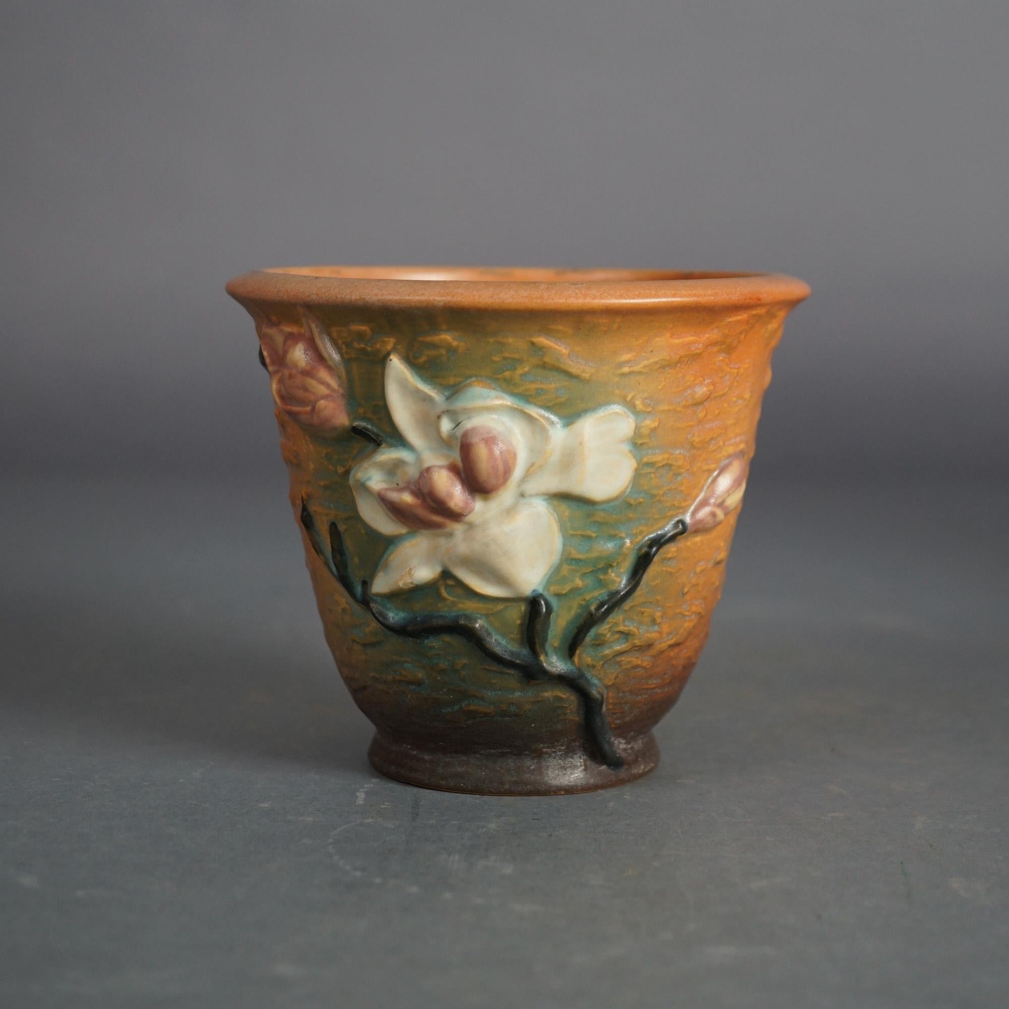 Four Pieces of Brown Roseville Art Pottery with Magnolia Pattern Mid 20thC 6