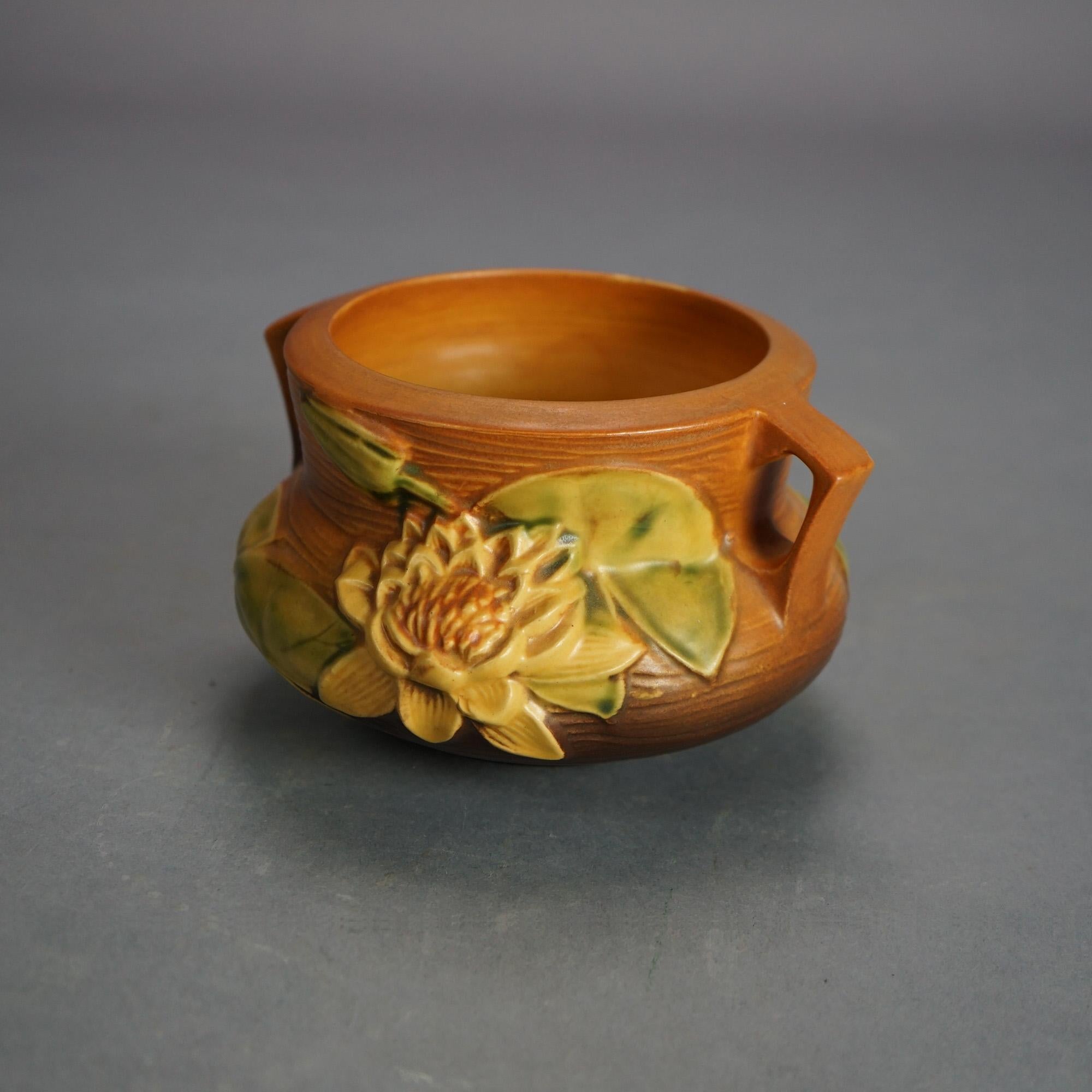 Four Pieces of Brown Roseville Art Pottery with Water Lily Pattern Mid 20thC 1