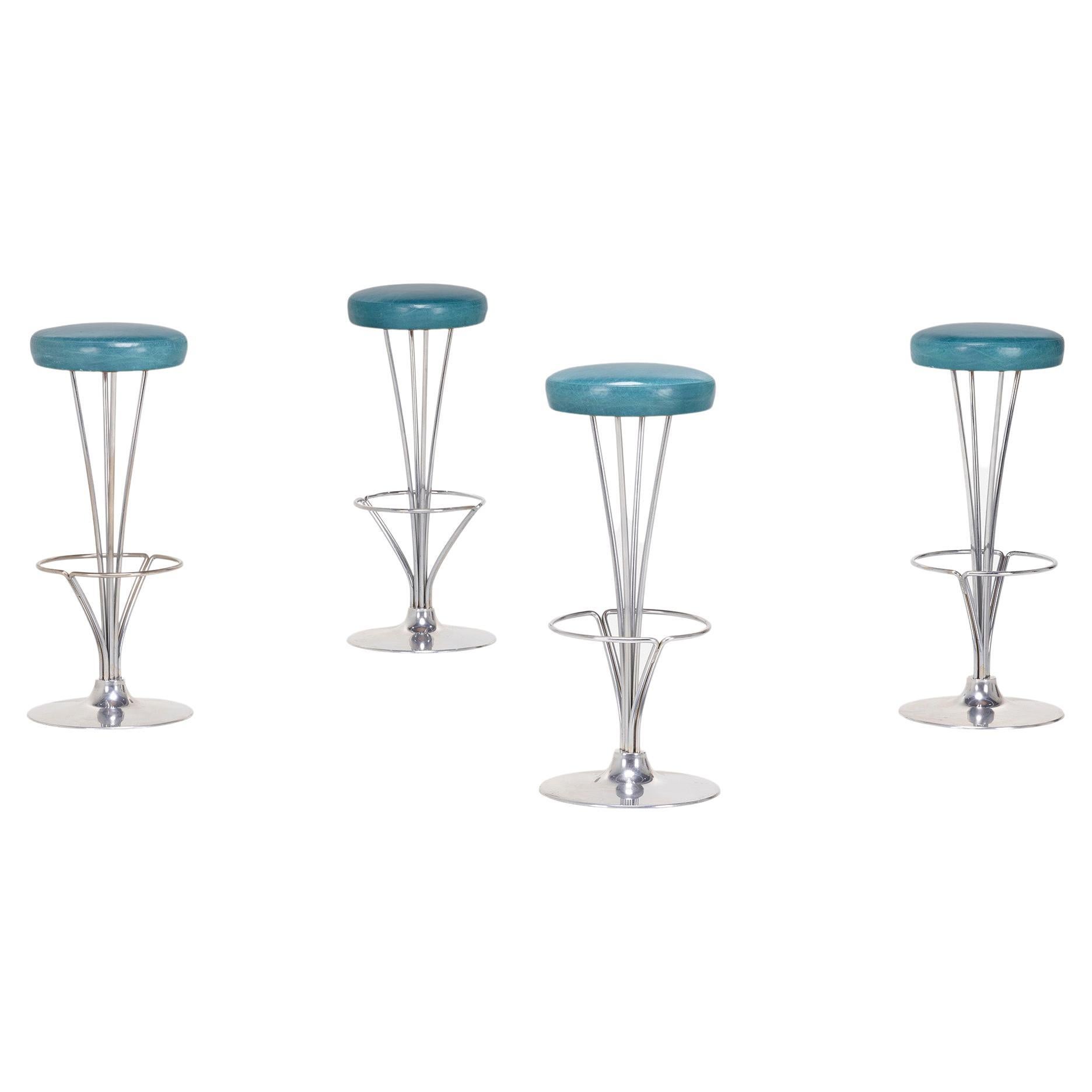 Four Piet Hein Barstools