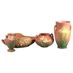 Four Pink Roseville Art Pottery Items with Iris Pattern Mid 20thC