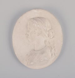 Four plaster wall reliefs. Approx. 1900