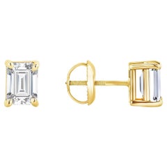 Boucles d'oreilles à quatre griffes en or 14 carats serties de diamants