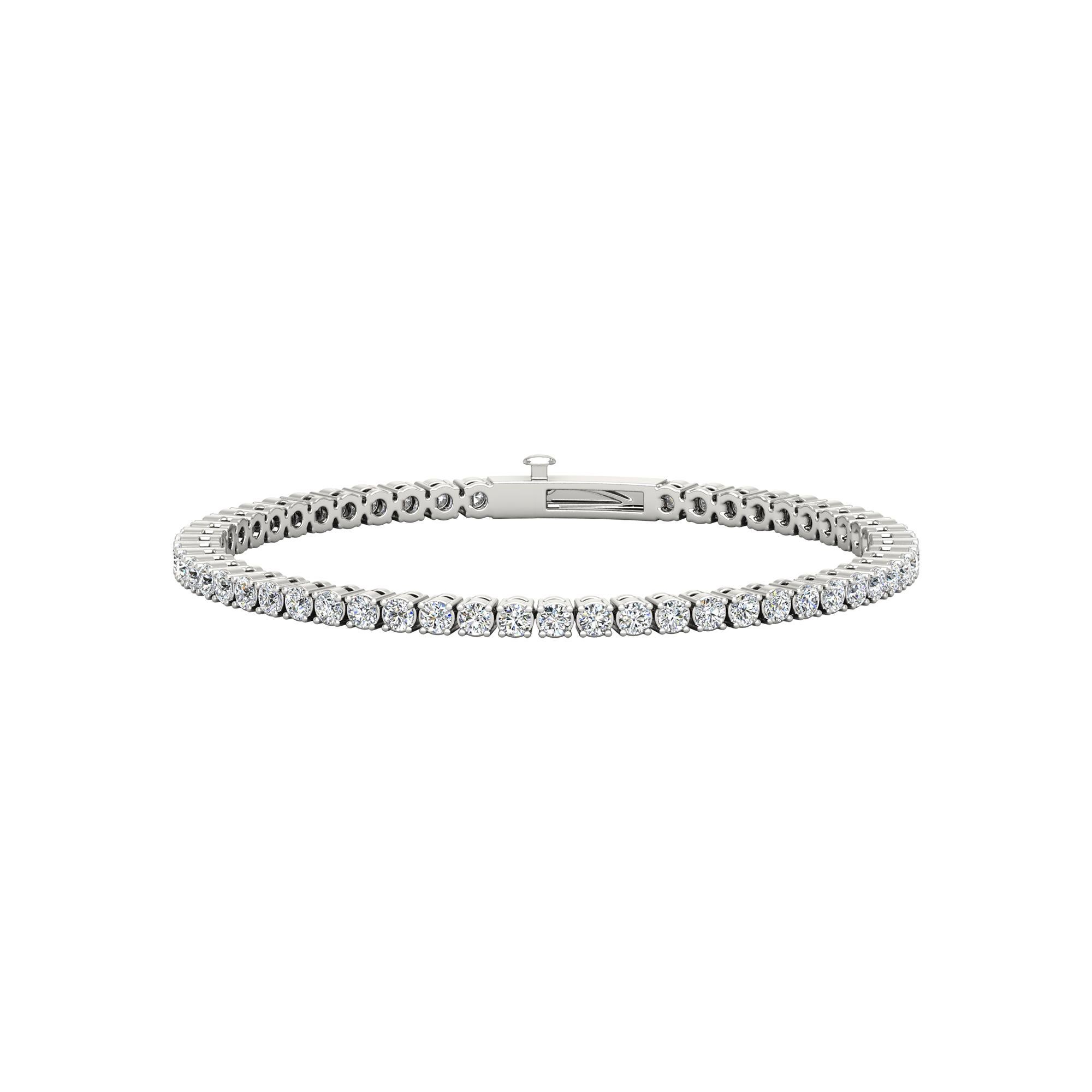 Make your outfit sparkle with this tennis bracelets features beautifully matched round natural diamonds. Elegance for every moment. 

METAL DETAILS: 18K White Gold 
DIAMOND DETAILS: Natural, Ethically sourced &, Conflict free.
DIAMOND SHAPES : 