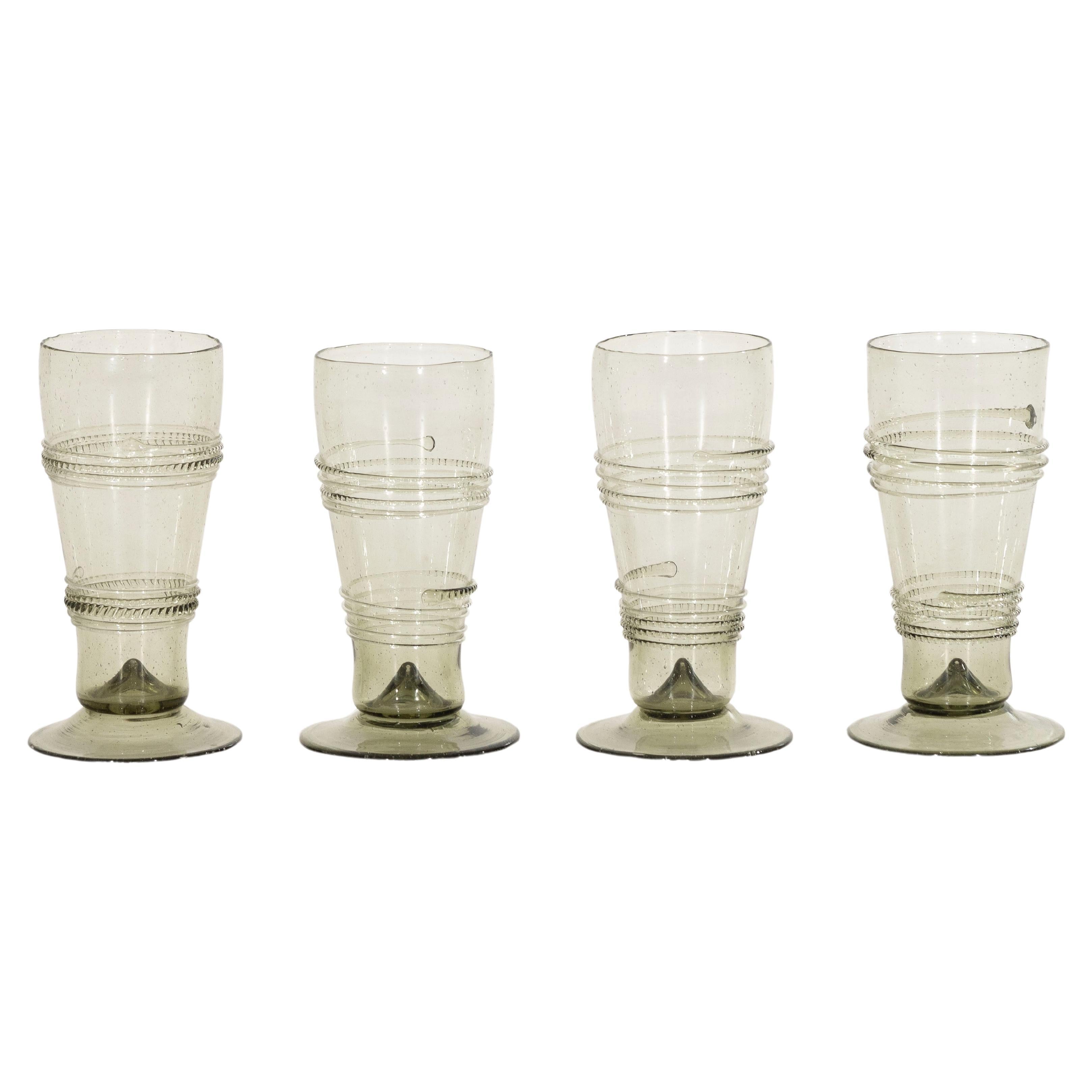 Four rare glasses with decorations, mid 20th C. For Sale