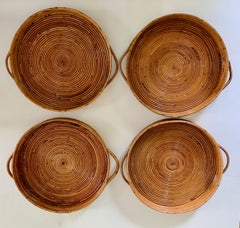 Four Rattan Serving Trays