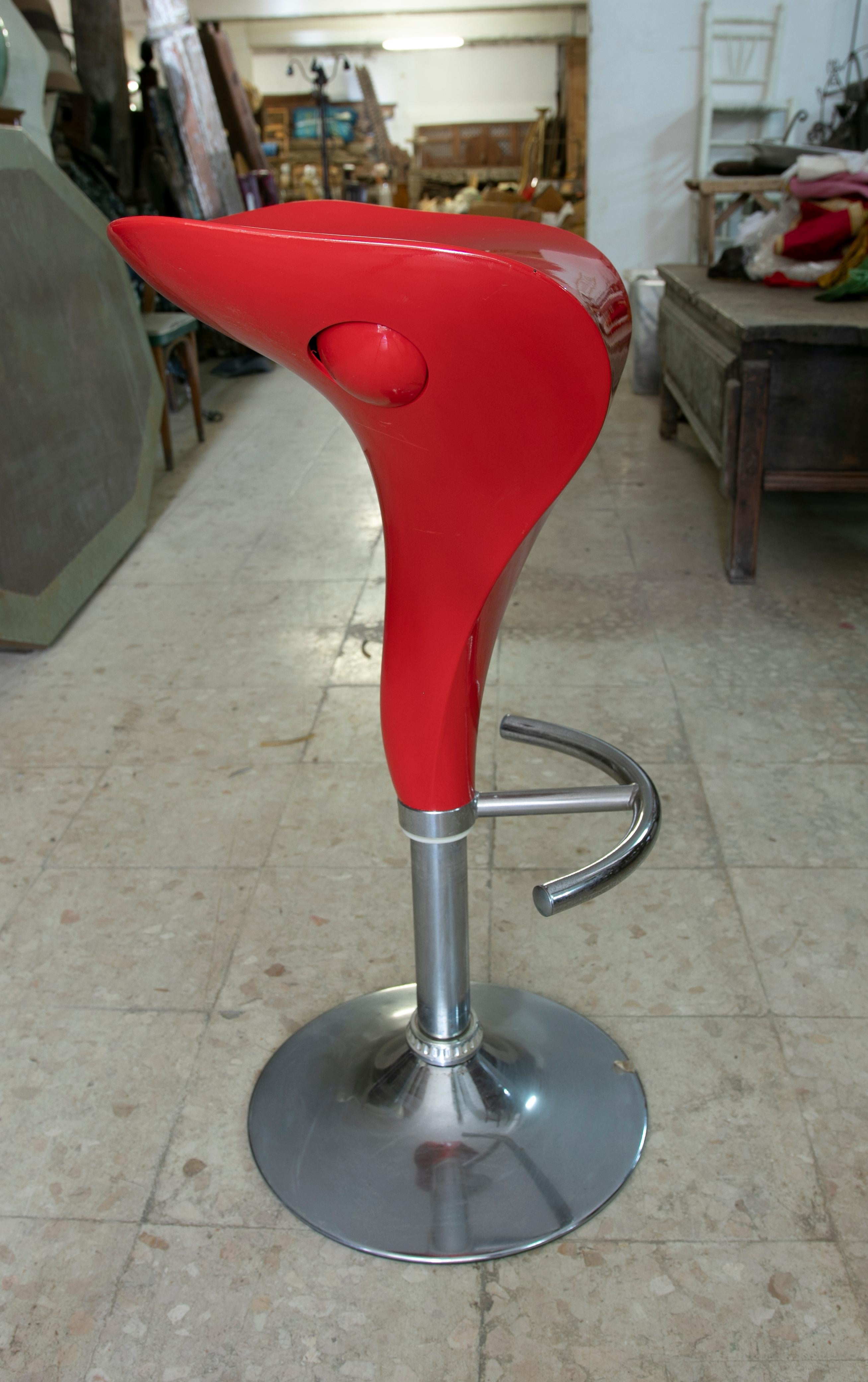 Stainless Steel Four Red Stools Set Without Backrest Made in Resine and Steel For Sale