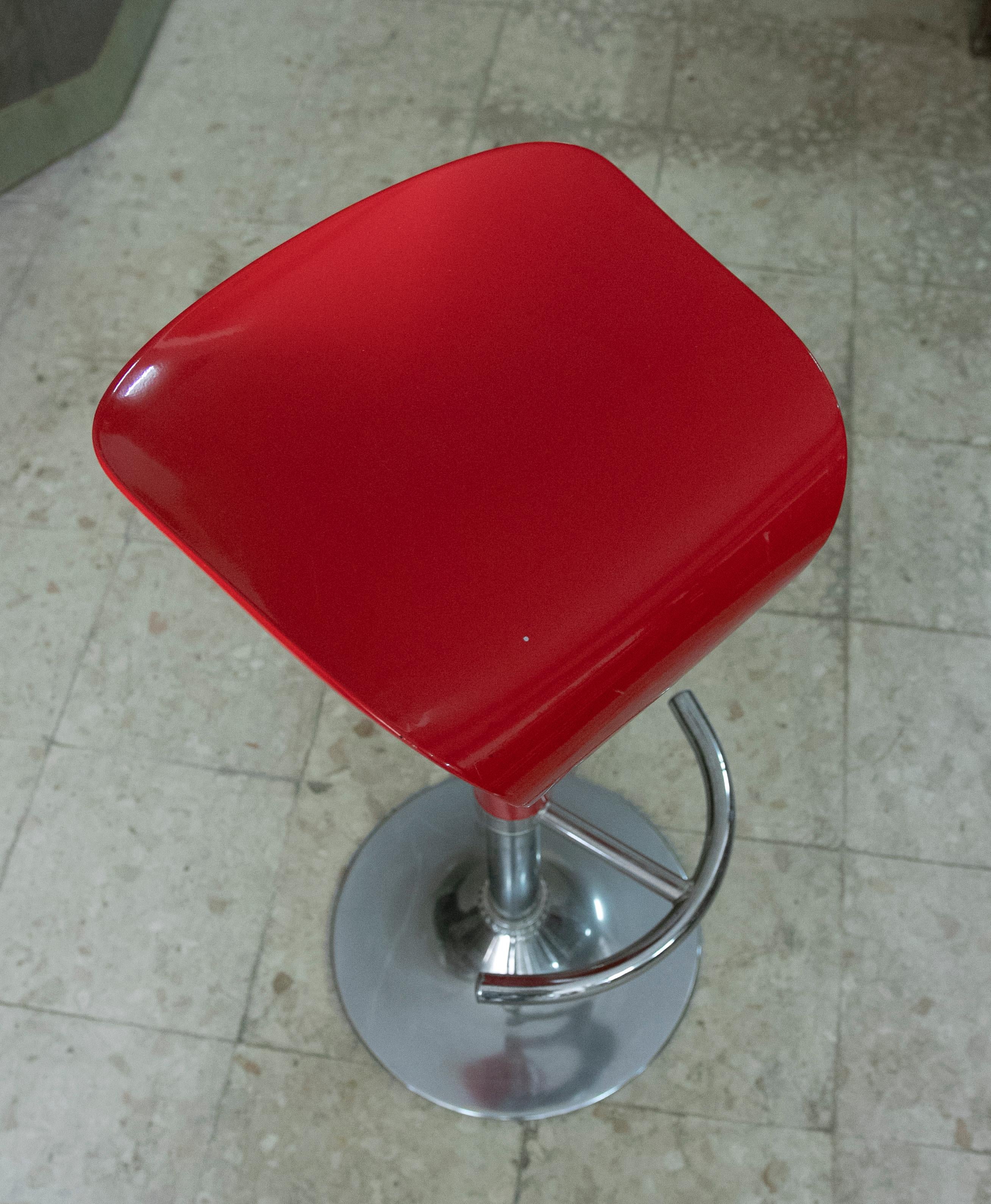 Four Red Stools Set Without Backrest Made in Resine and Steel For Sale 1
