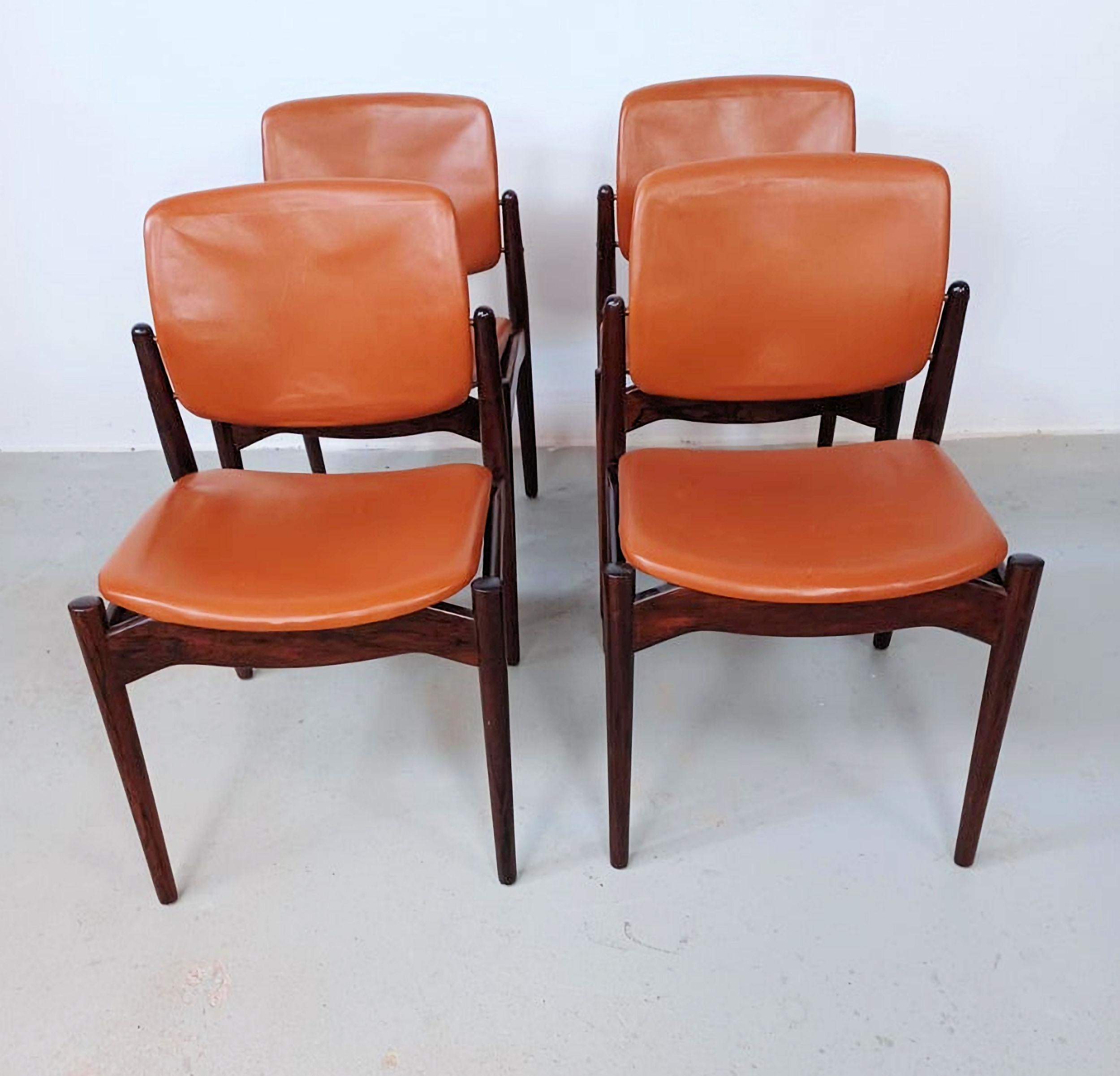 Four restored Erik Buch  rosewood dining chairs customized upholstery included in the listing price.

This Erik Buch chair that is only very rarely seen in rosewood has a simple but sophisticated and elegant scandinavian modern design with it´s