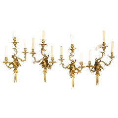 Four Rococo Style Gilt Bronze Three Light Parrot Sconces