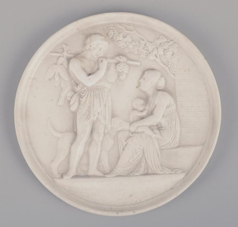 Scandinavian Four round wall reliefs in plaster. Ca 1900 For Sale