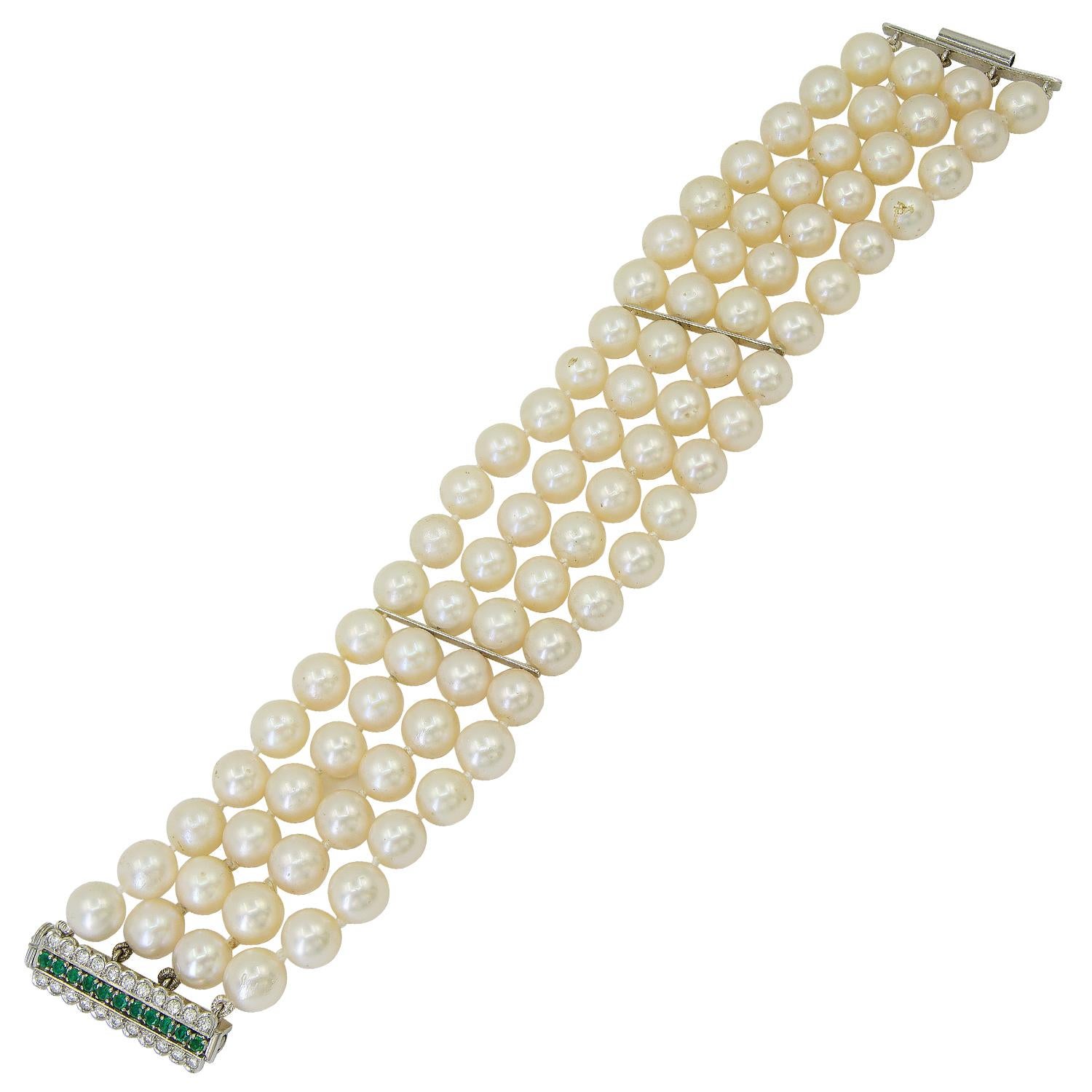 Four Row Pearl, Diamond Emerald Bracelet
A multi strand cultured pearls, diamonds and emerald bracelet.
Metal: platinum
Pearls: approx. 7.7mm
measures approx. 7″ in length by 1.25″ width
circa 1990s

