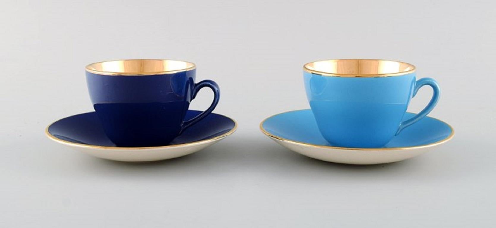 Four Royal Copenhagen / aluminia confetti coffee cups with saucers in glazed faience. Mid-20th century.
The cup measures: 7 x 5.3 cm.
Saucer diameter: 12 cm.
In excellent condition.
Stamped.
1st factory quality.