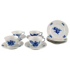 Four Royal Copenhagen Blue Flower Angular Teacups with Saucers and Plates