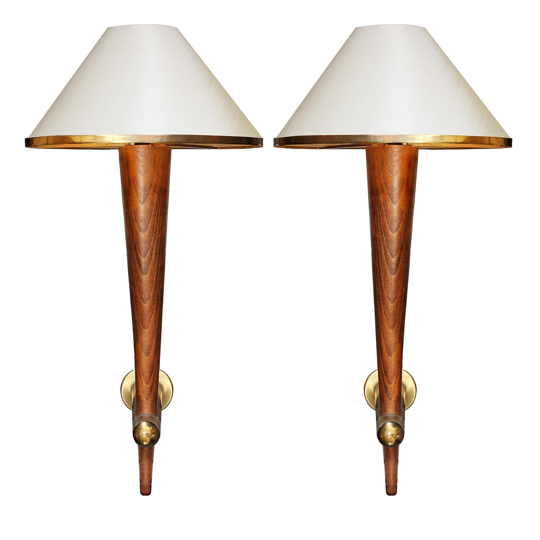 Rare set of FOUR sconces from a set of 16 we purchased from the Cafe Francais in Paris, France, circa 1970. 
The sconces are in patinated beech wood, brass arms and frames and circular frosted glass reflectors.
Lampshades are in ivory Pongee fabric