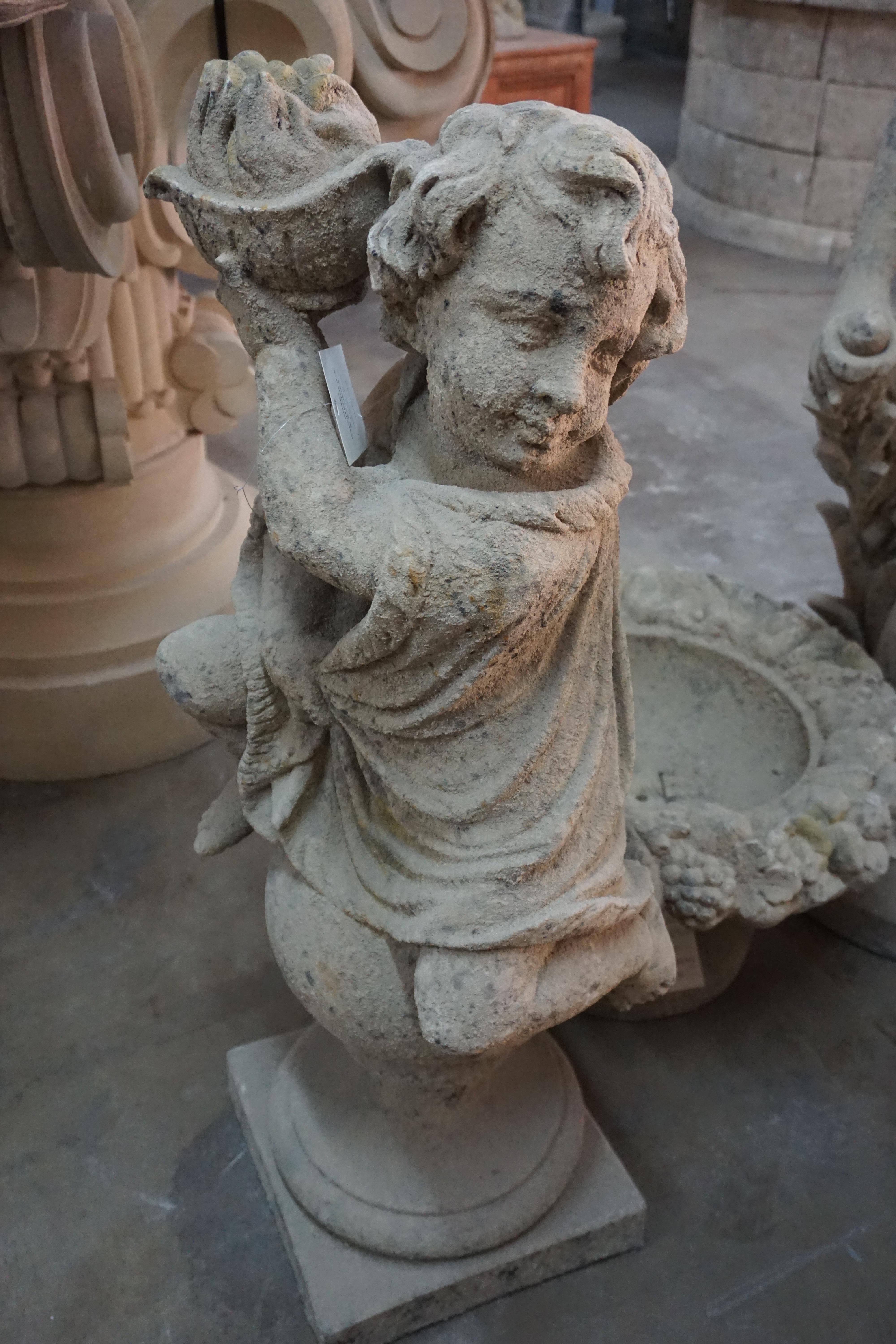This statue is part of a Four Seasons Putti collection, this lounging putti statues with fire represents 