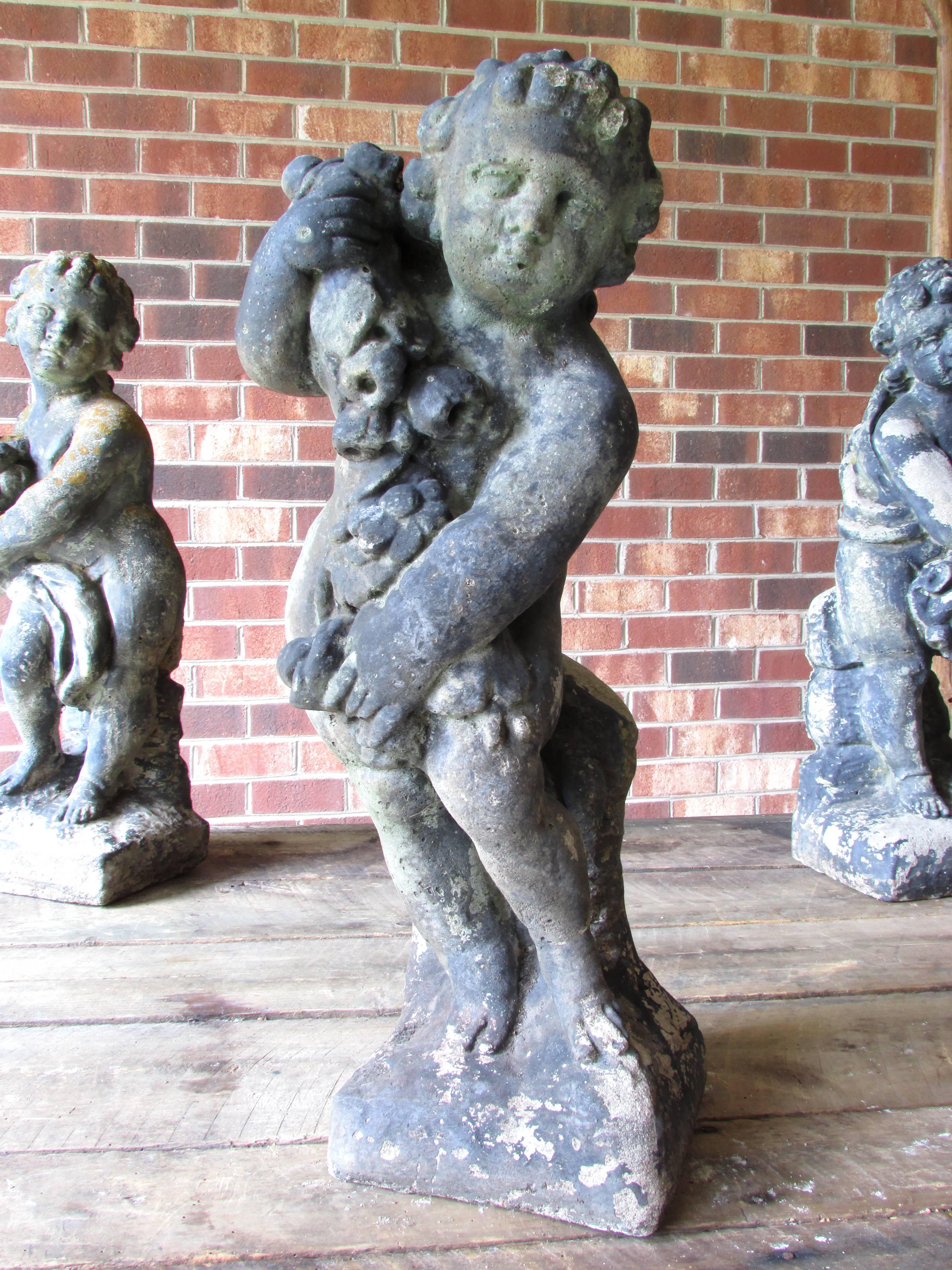 Four Seasons Cherubs Cast Stone In Distressed Condition For Sale In High Point, NC